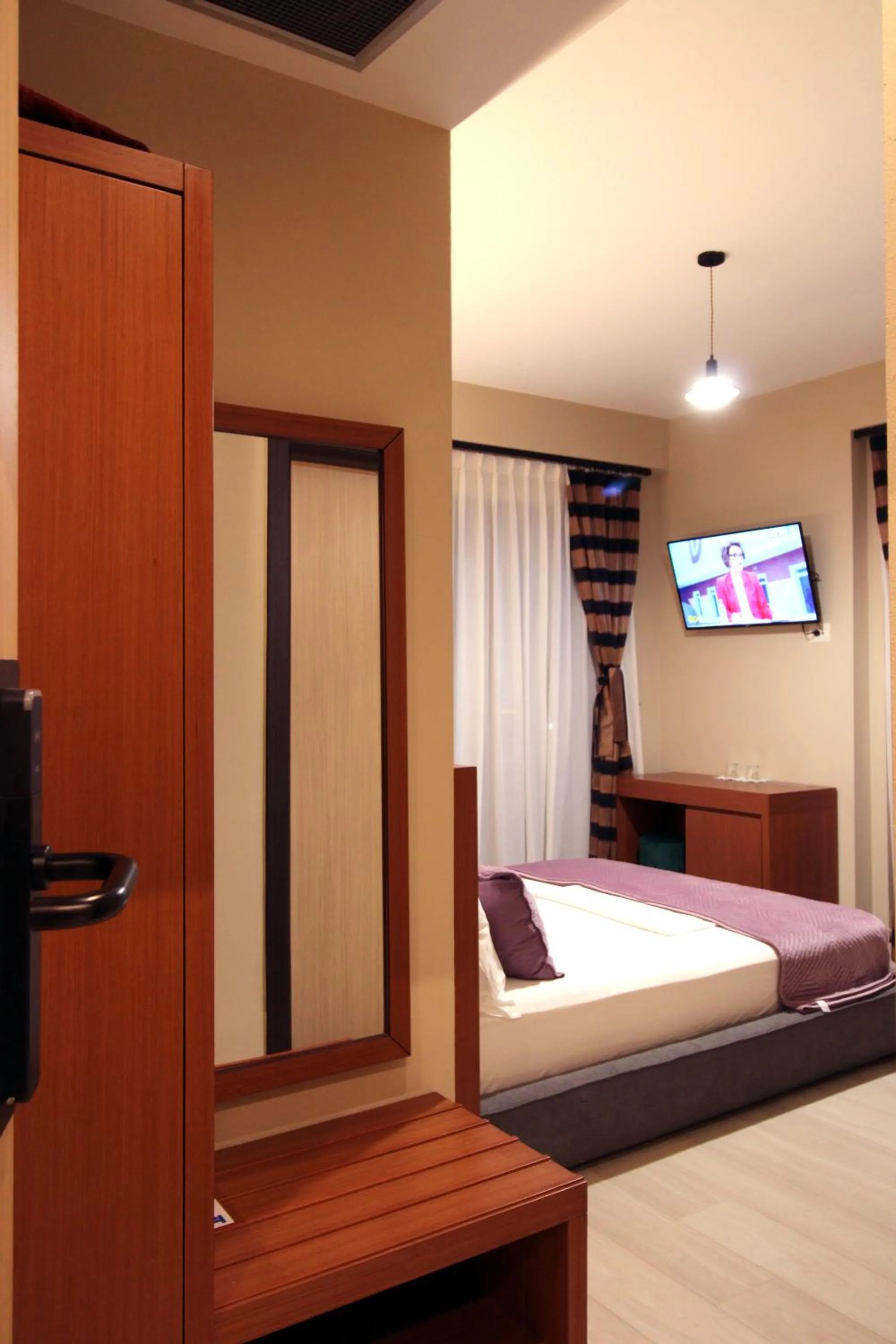 Bedroom in 6 Milje Hotel