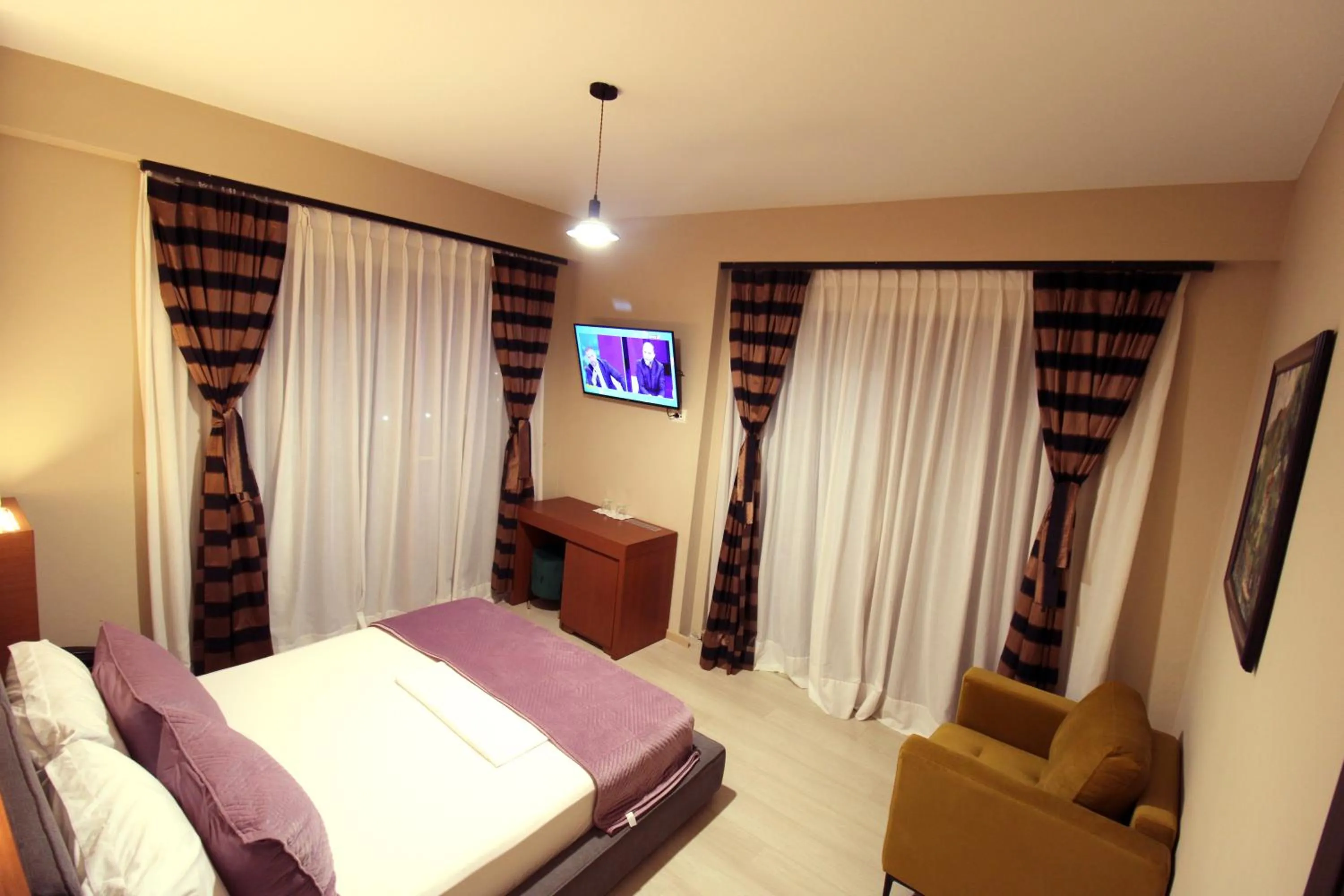 Bedroom in 6 Milje Hotel