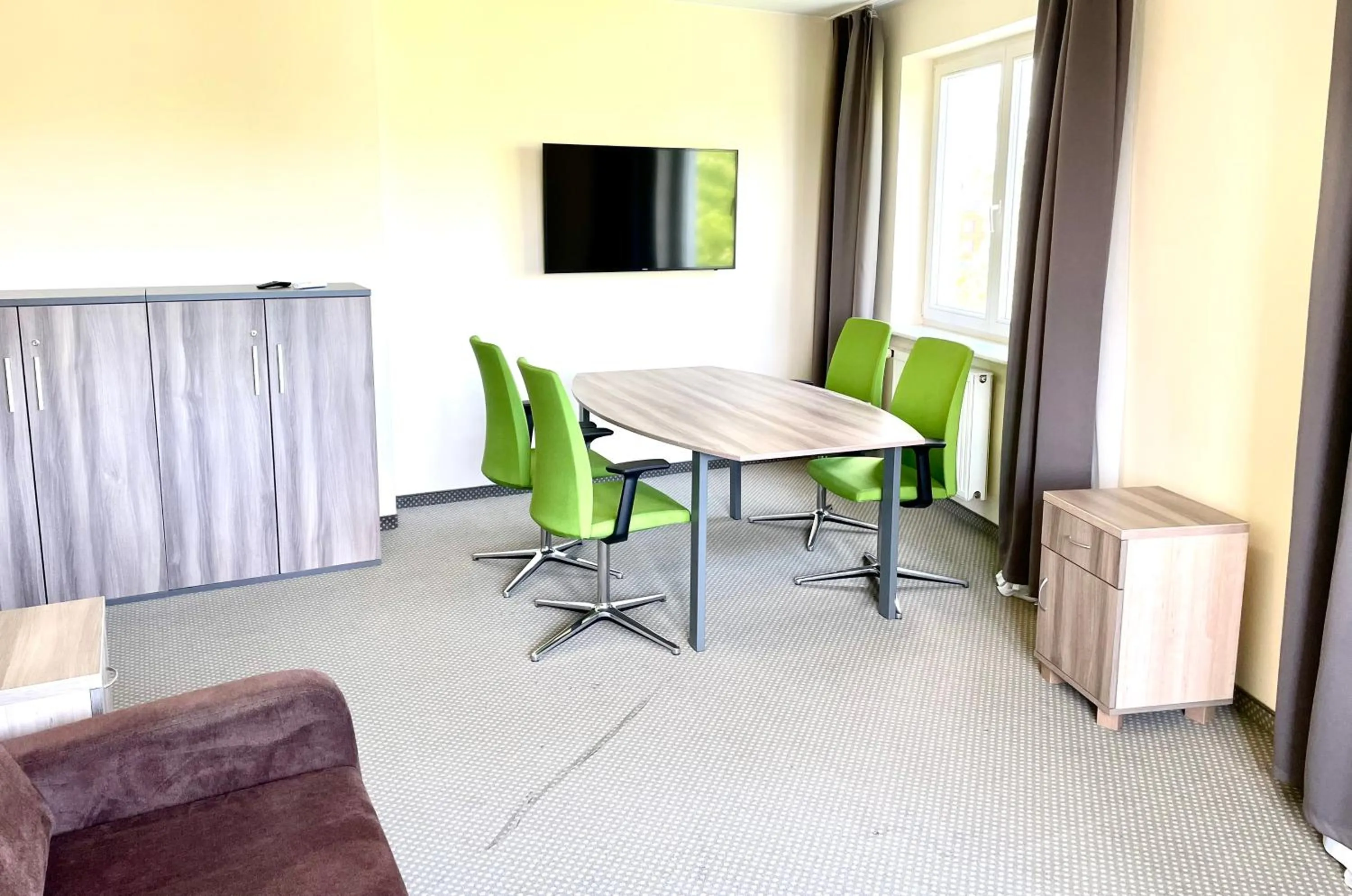 Communal lounge/ TV room in Poleczki Residence Apartments