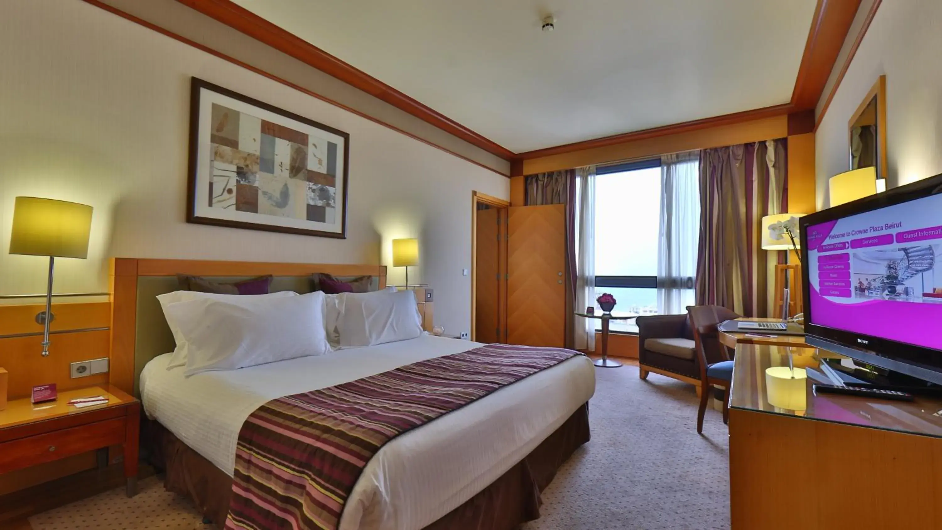 Bedroom, Bed in Crowne Plaza Hamra Beirut by IHG Bedroom, Bed in Crowne Plaza Hamra Beirut by IHG