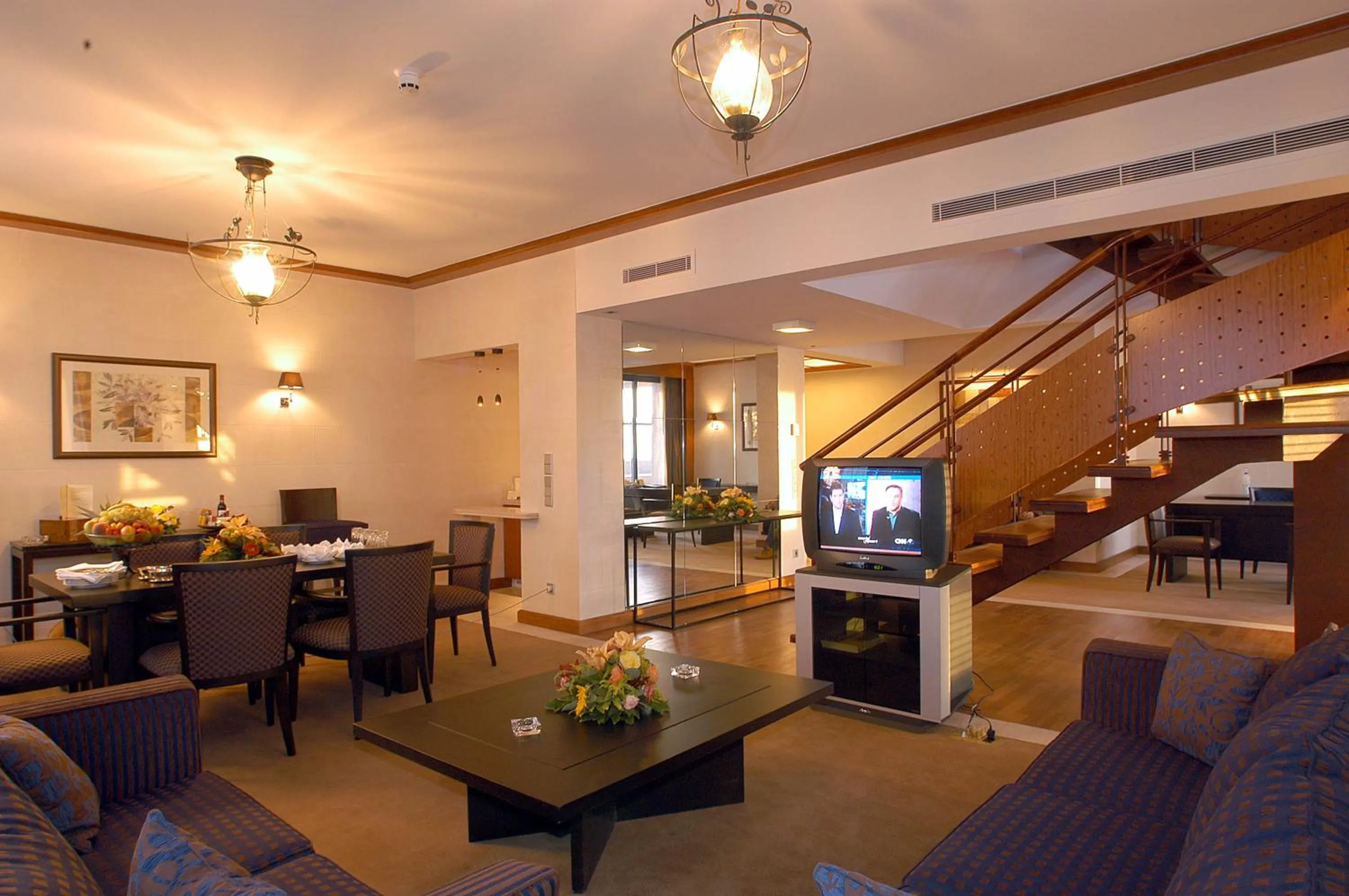 Communal lounge/ TV room in Crowne Plaza Hamra Beirut by IHG