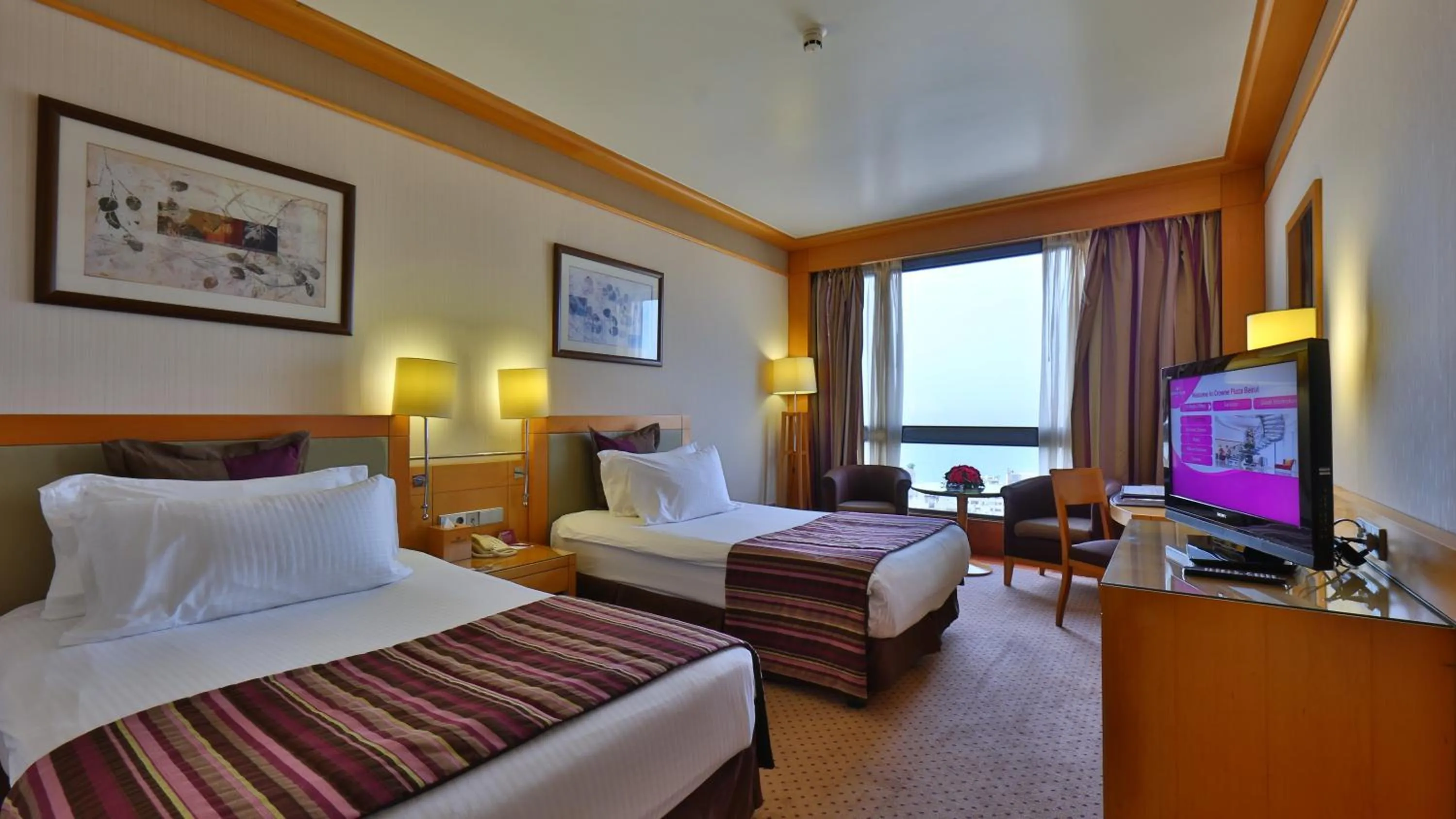 Photo of the whole room, Bed in Crowne Plaza Hamra Beirut by IHG