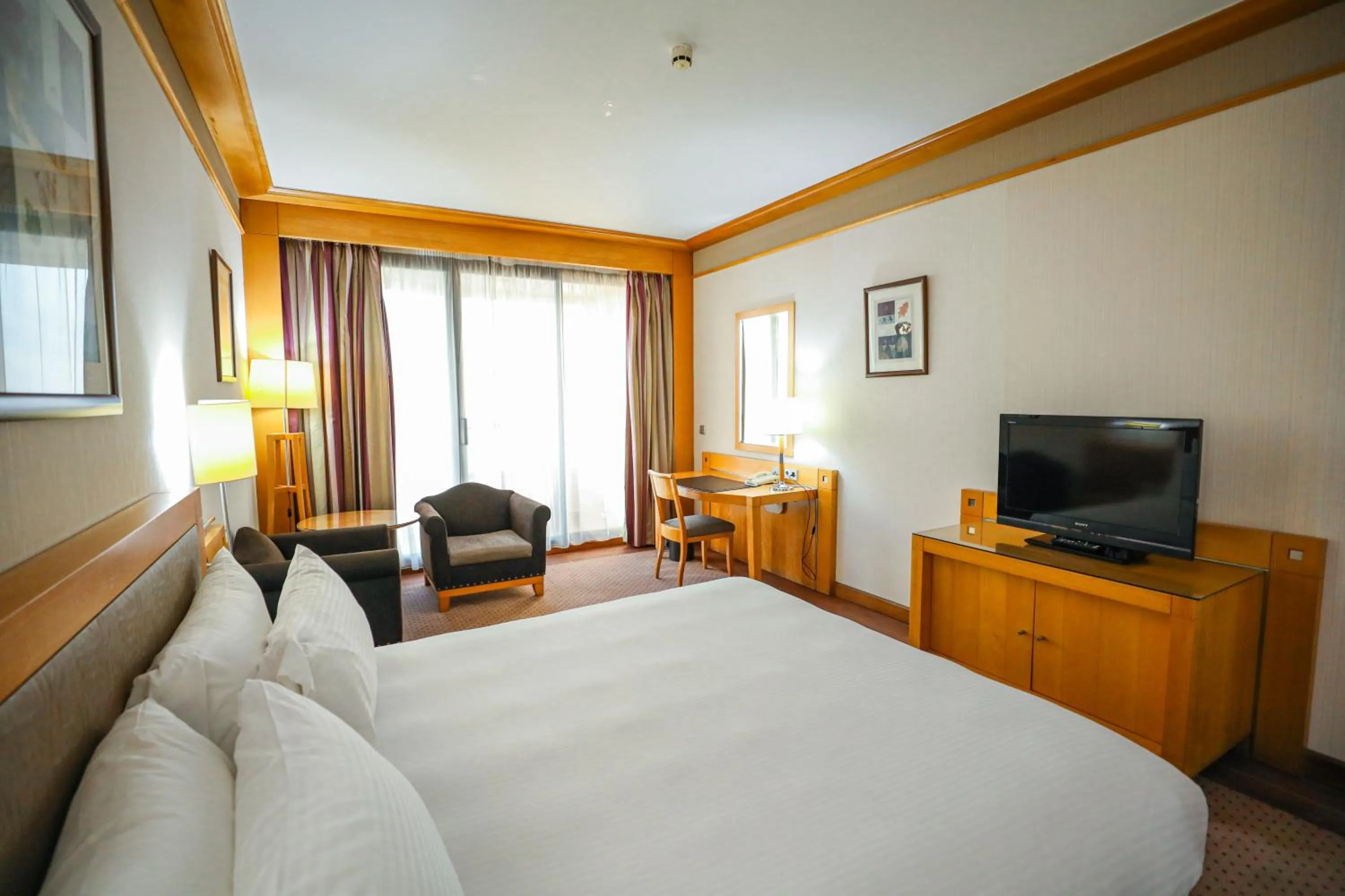 Bed in Crowne Plaza Hamra Beirut by IHG