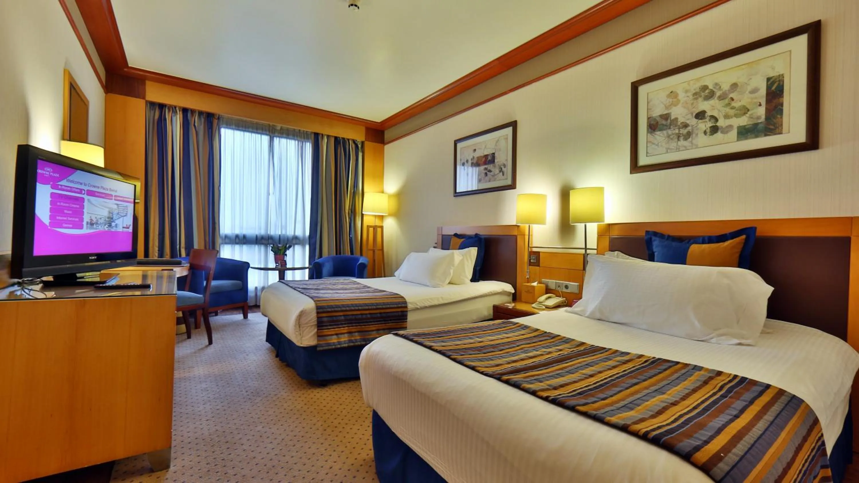 Photo of the whole room, Bed in Crowne Plaza Hamra Beirut by IHG