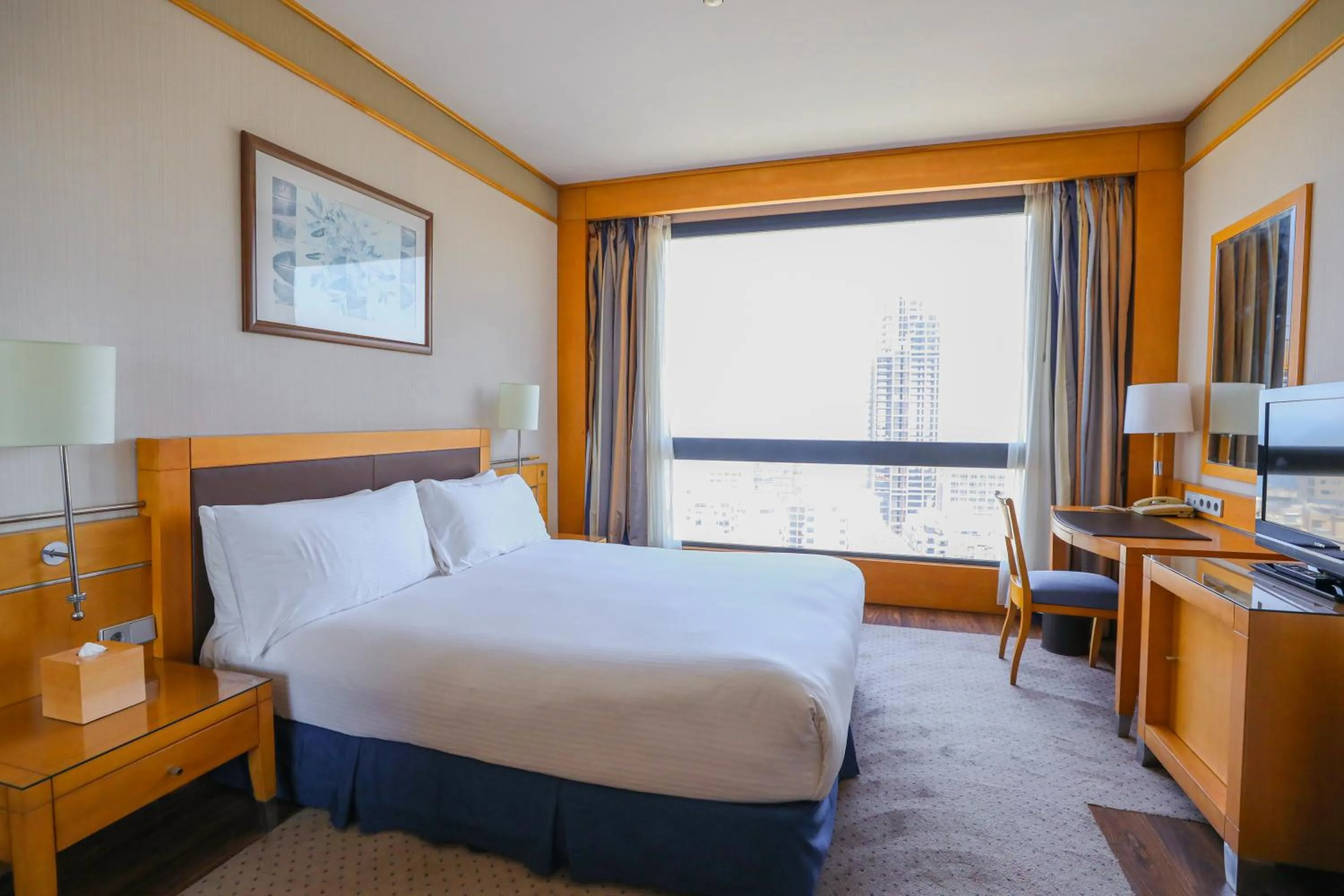 Photo of the whole room, Bed in Crowne Plaza Hamra Beirut by IHG