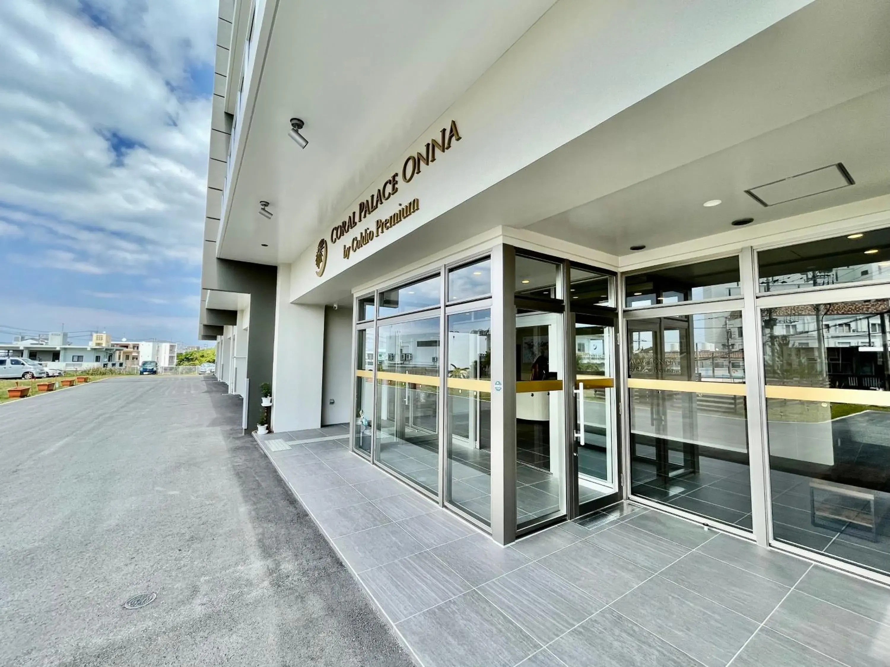 Facade/entrance in Coral Palace Onna by Sunset Avenue Facade/entrance in Coral Palace Onna by Sunset Avenue
