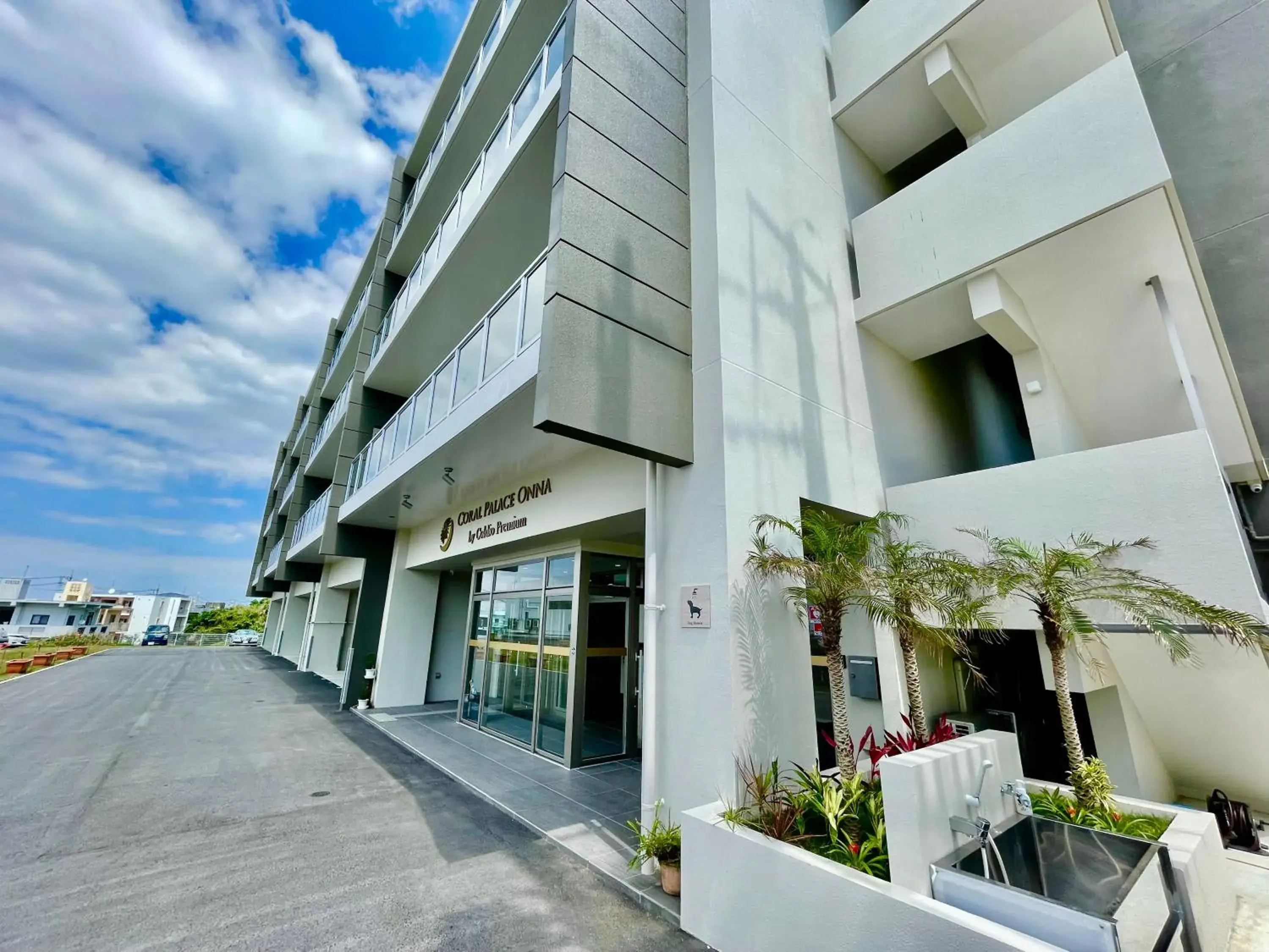 Facade/entrance in Coral Palace Onna by Sunset Avenue Facade/entrance in Coral Palace Onna by Sunset Avenue