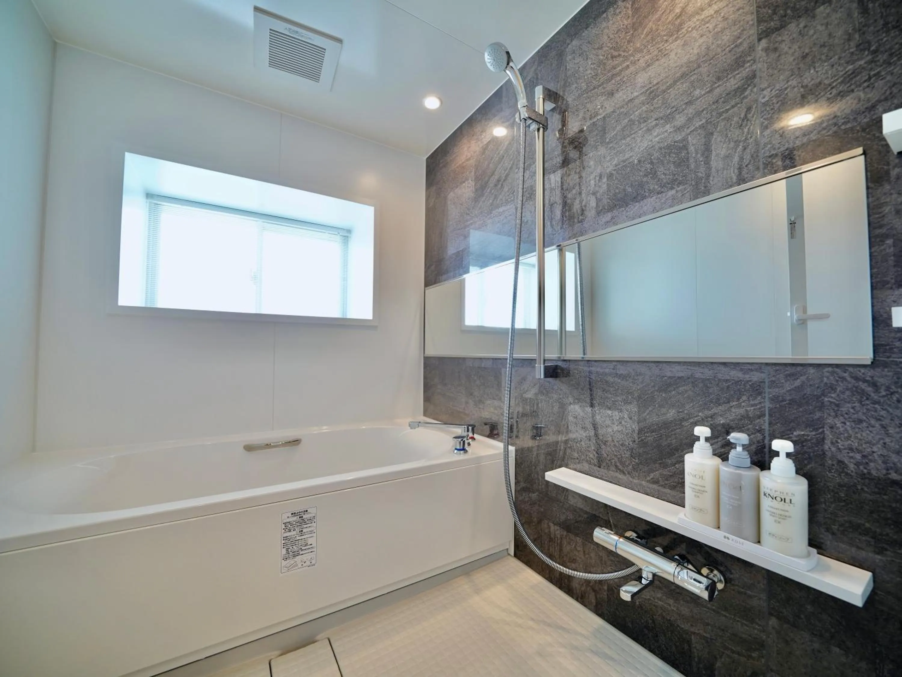 Bathroom in Coral Palace Onna by Sunset Avenue