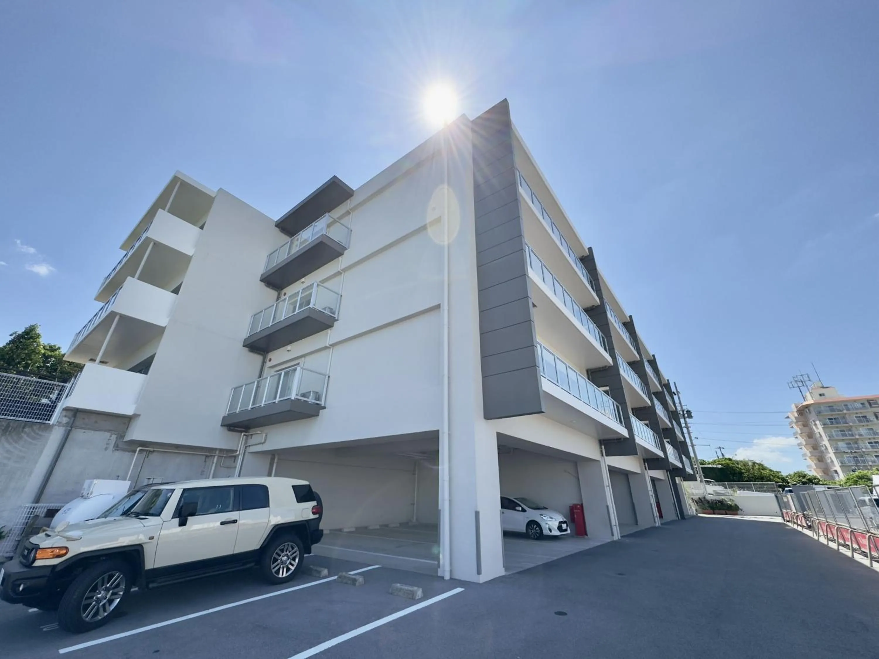 Parking in Coral Palace Onna by Sunset Avenue