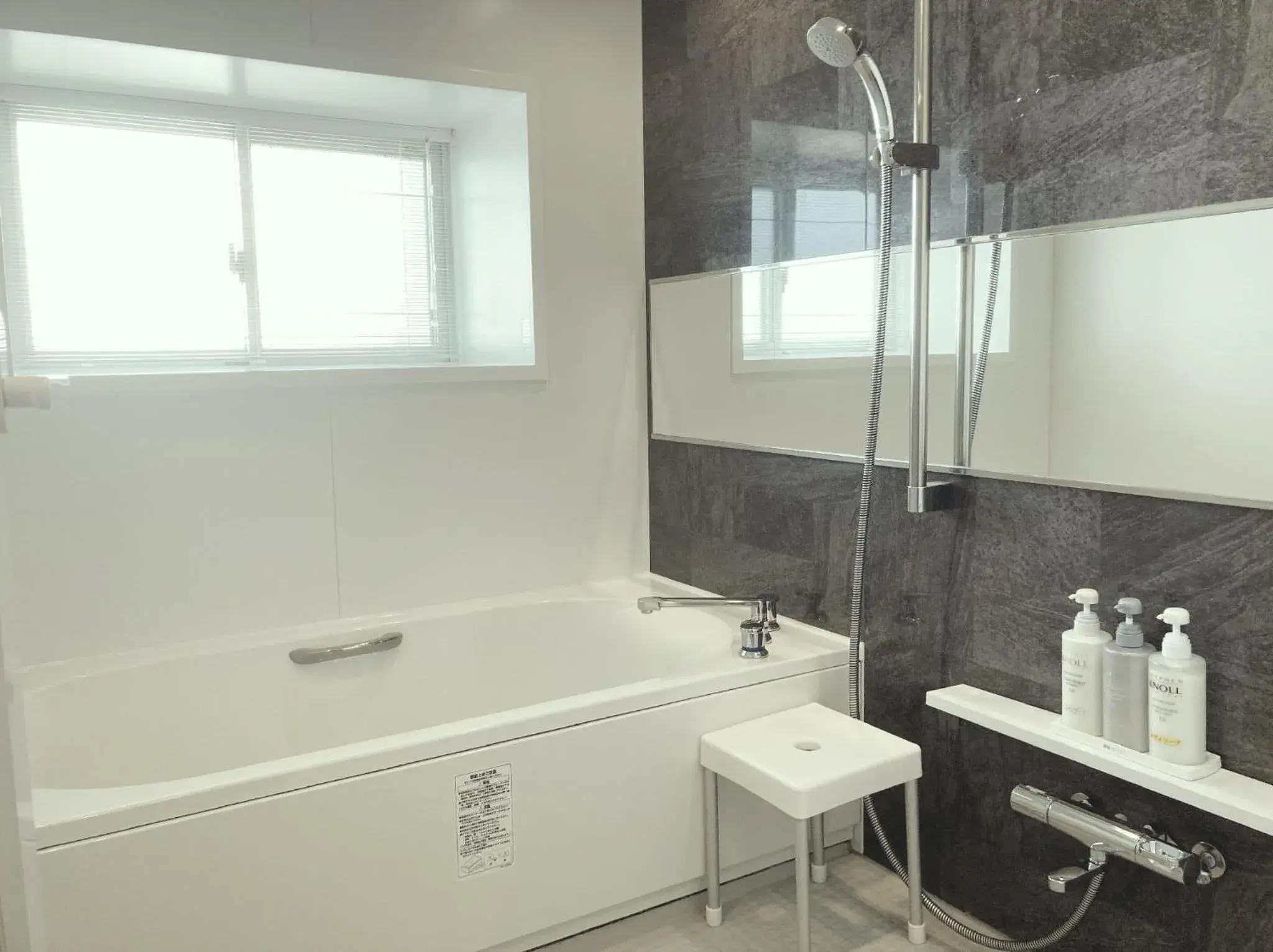 Bathroom in Coral Palace Onna by Sunset Avenue Bathroom in Coral Palace Onna by Sunset Avenue