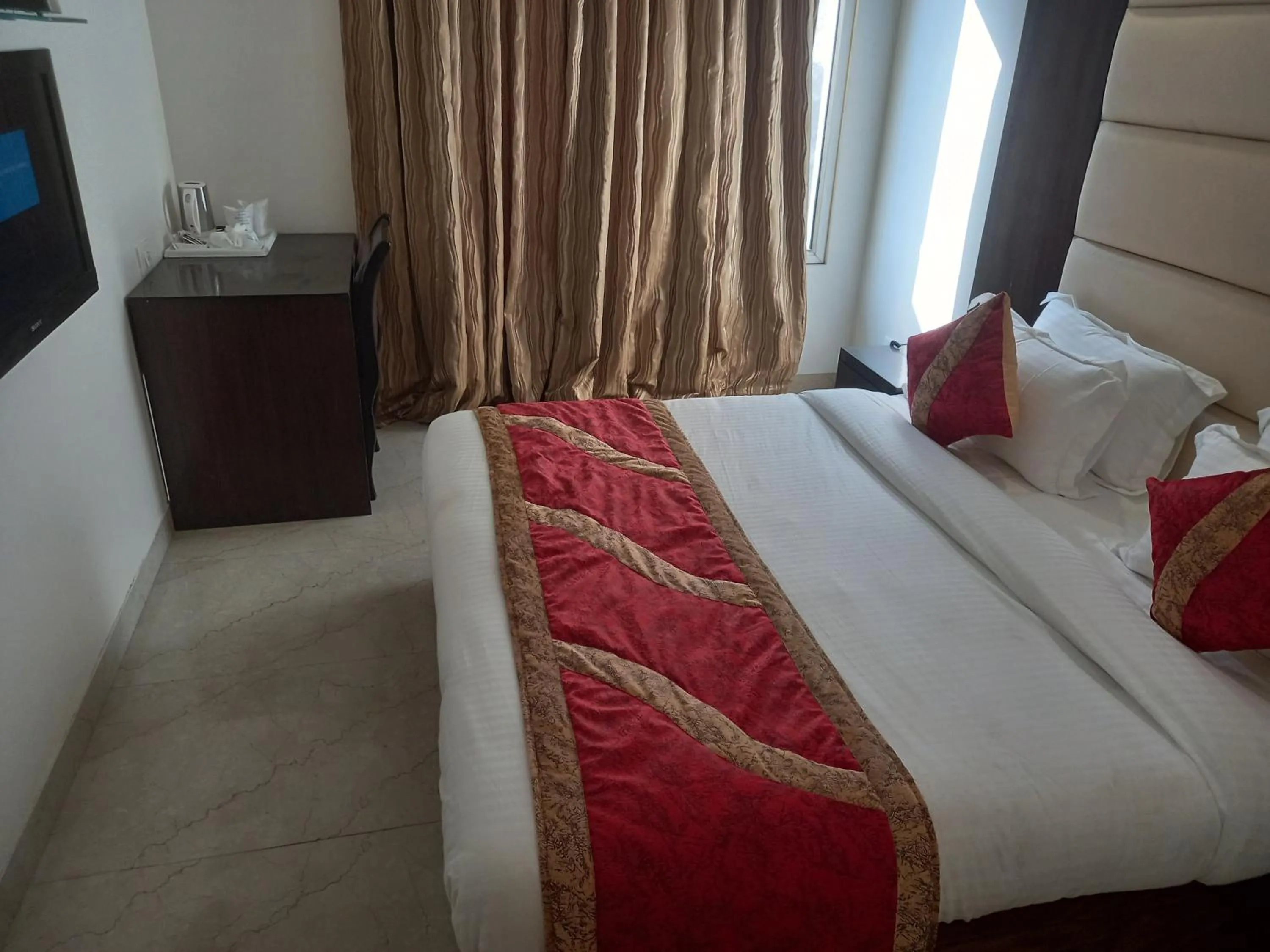 Photo of the whole room, Bed in Hotel Benz International, Karol Bagh