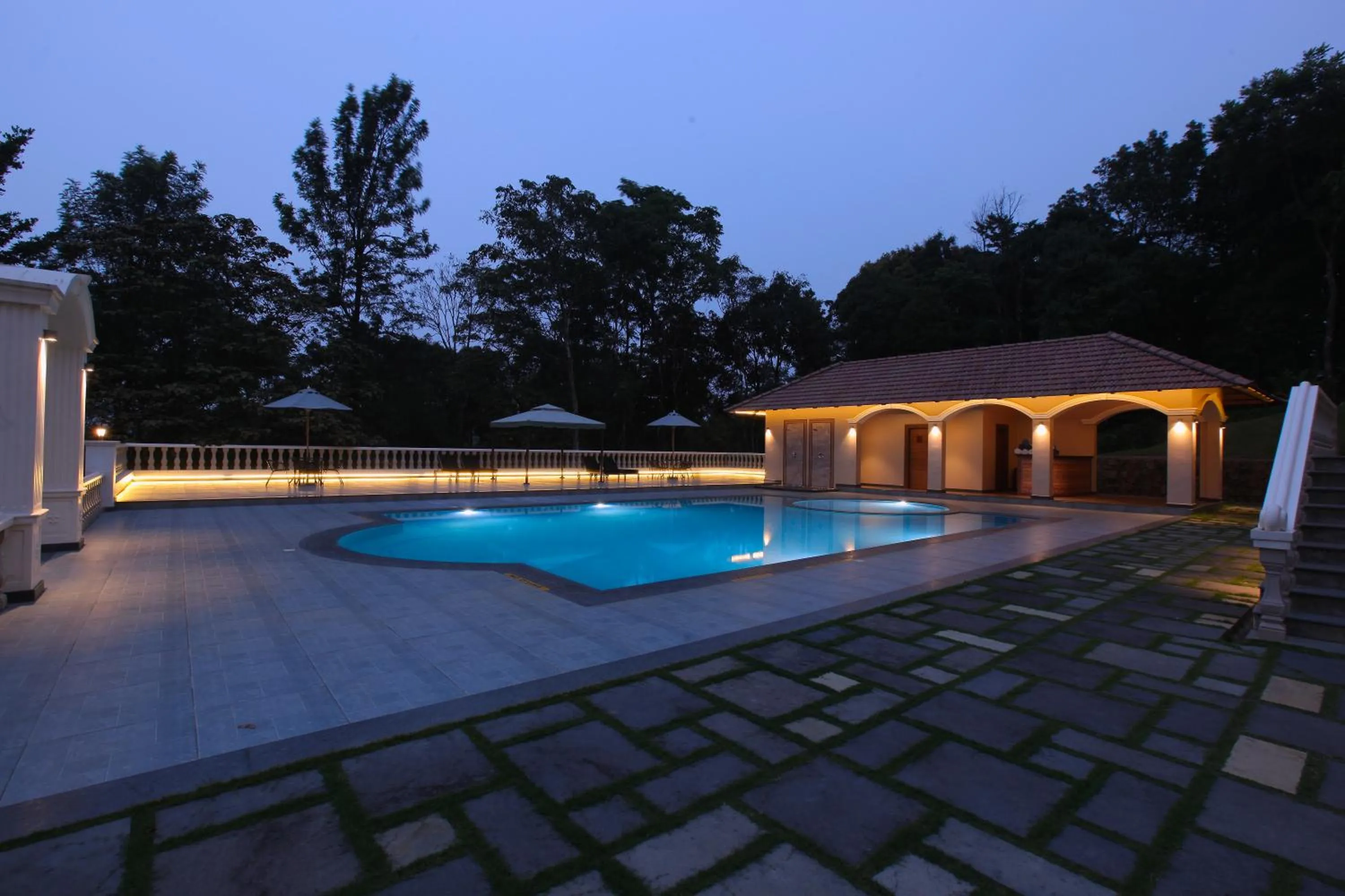 Swimming pool in Montrose Golf Resort and Spa - Coorg