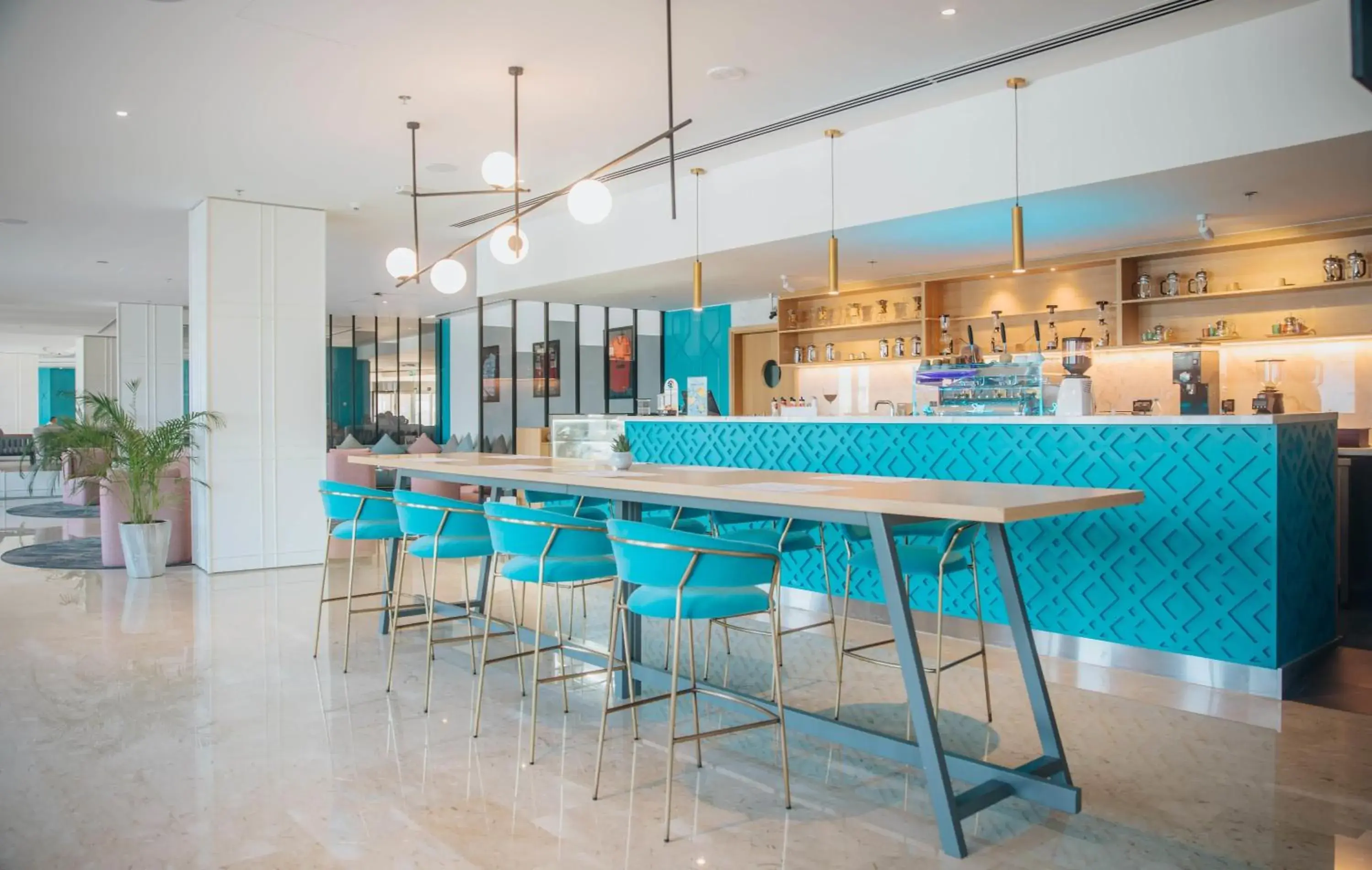 Lounge or bar in Occidental Sharjah Grand Lounge or bar in Occidental Sharjah Grand