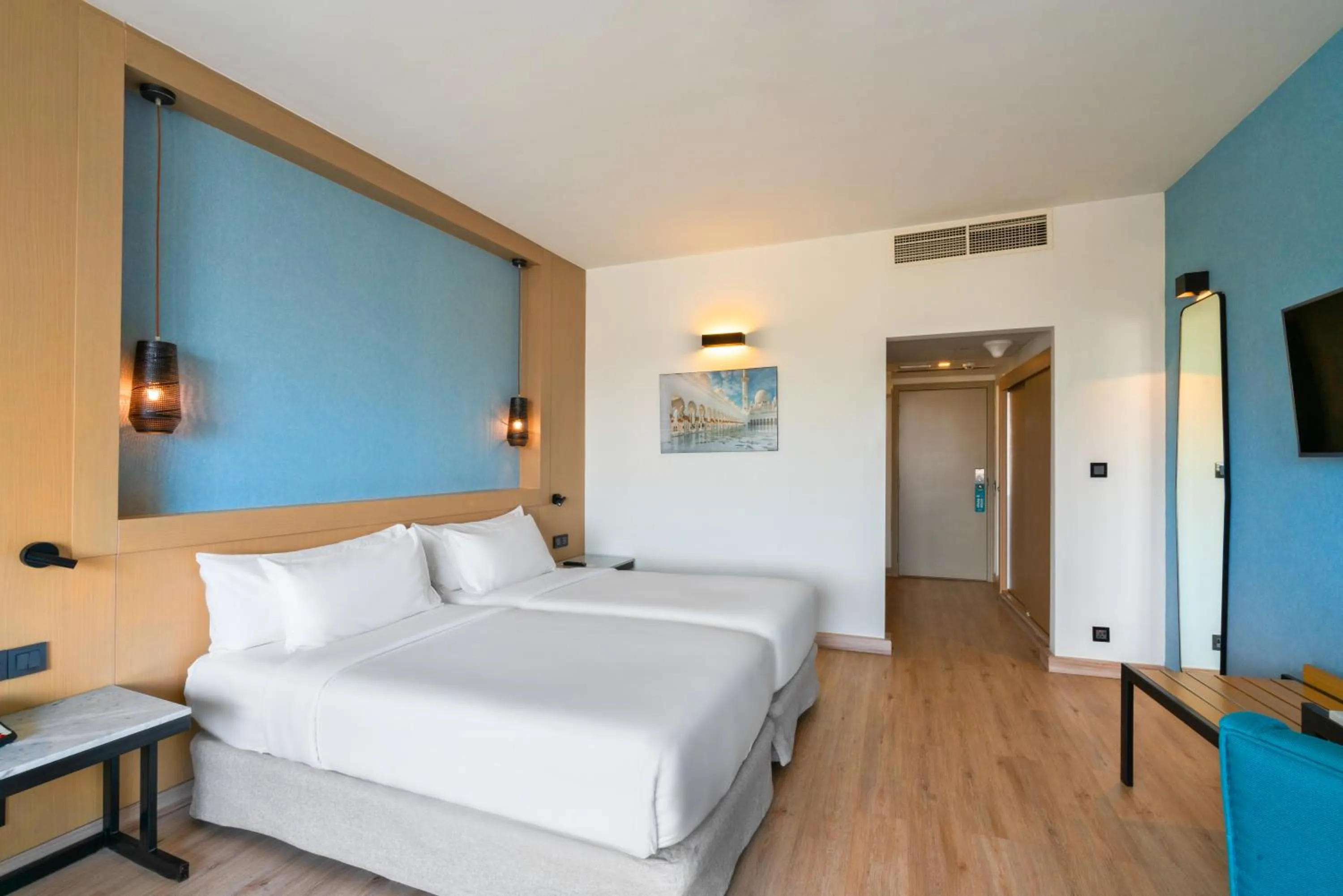 Photo of the whole room, Bed in Occidental Sharjah Grand