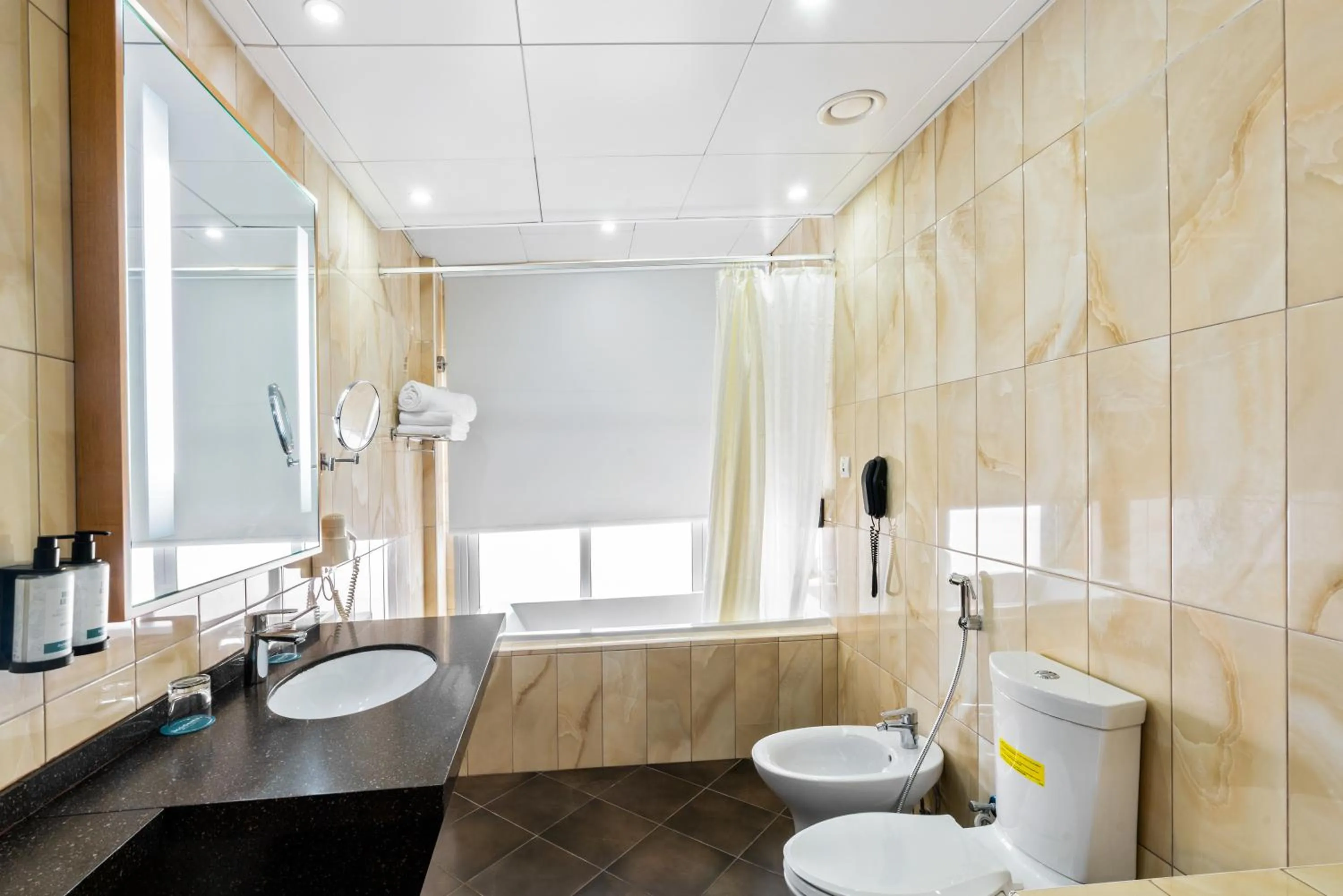 Bathroom in Occidental Sharjah Grand