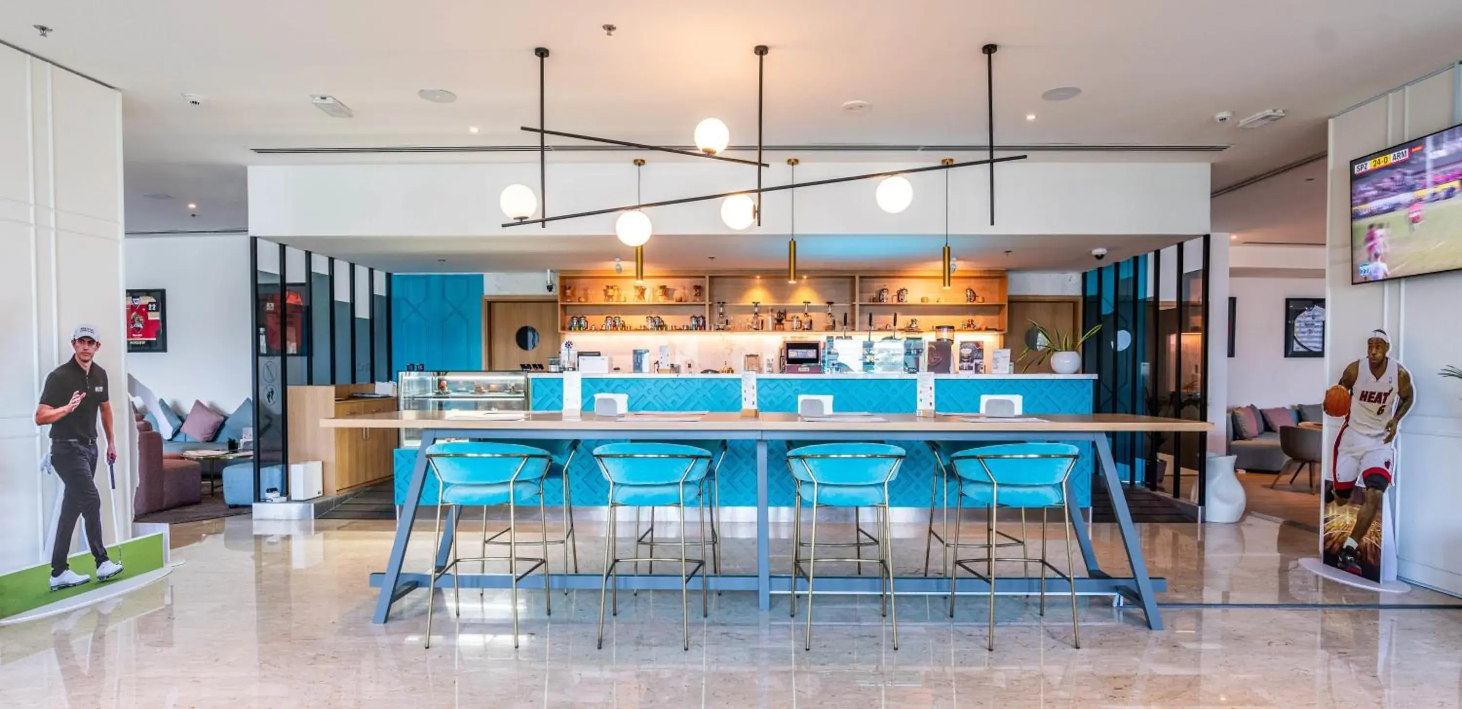 Lounge or bar in Occidental Sharjah Grand Lounge or bar in Occidental Sharjah Grand