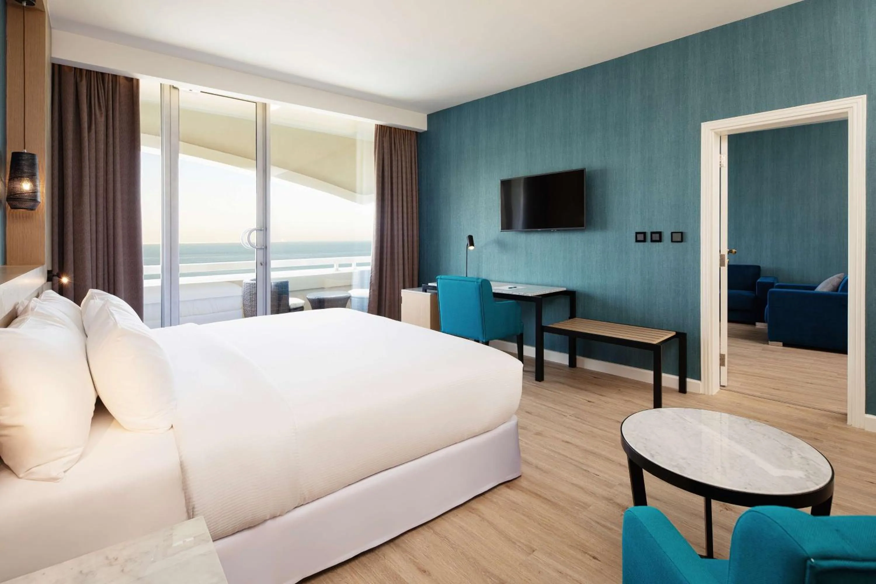 Photo of the whole room, Bed in Occidental Sharjah Grand