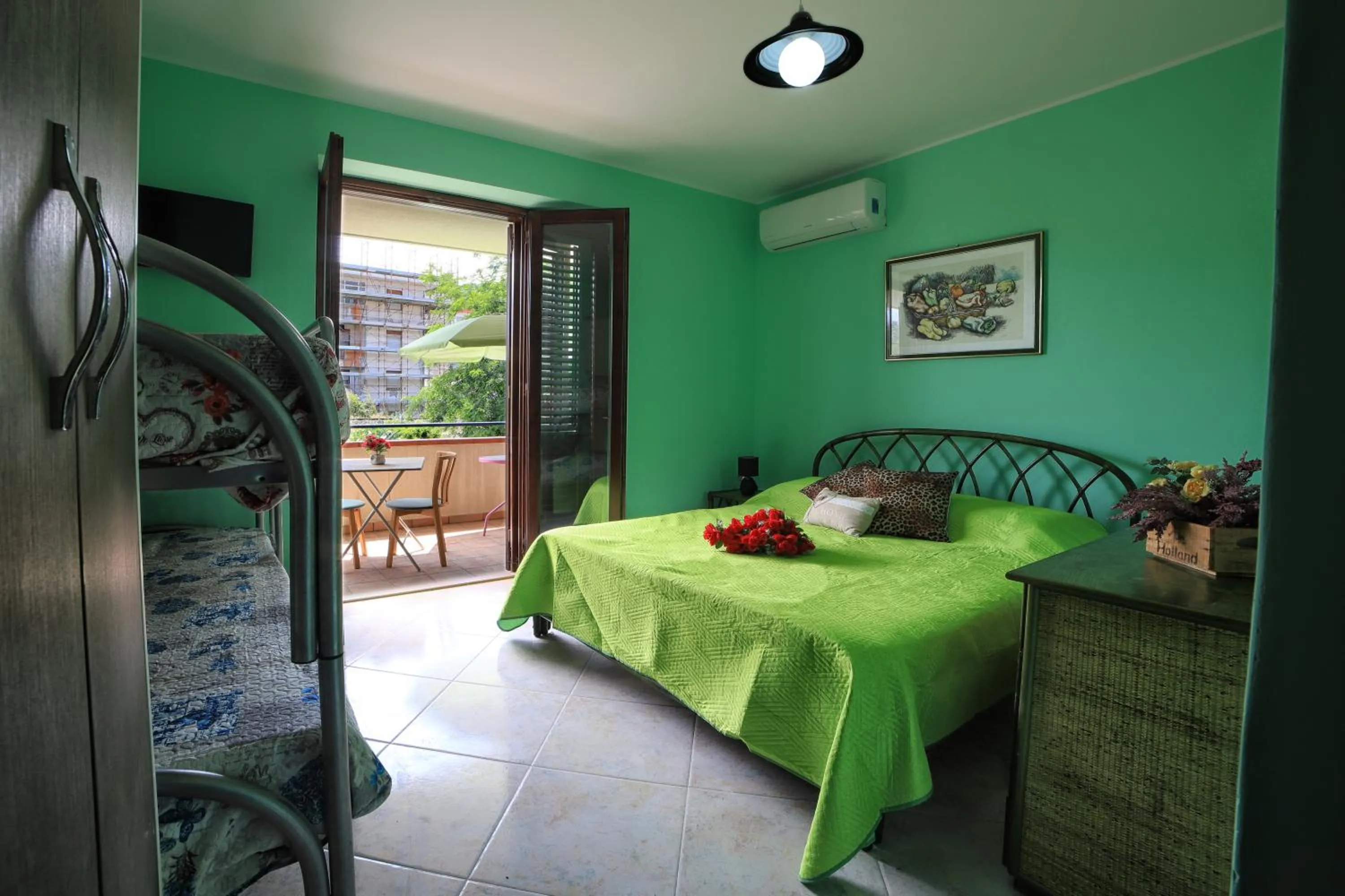 Quadruple Room with Balcony in B&B PRINCESS ROOM