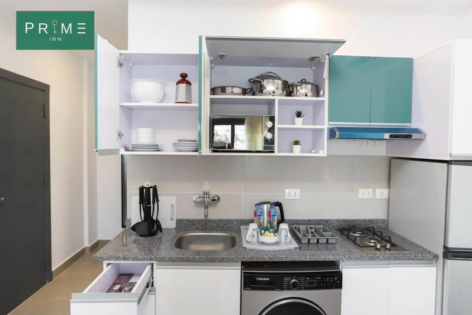 Kitchen or kitchenette in Prime Inn 10th Of Ramadan