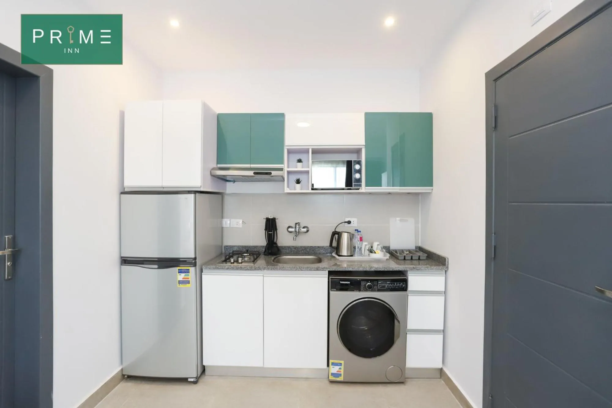 Kitchen or kitchenette in Prime Inn 10th Of Ramadan