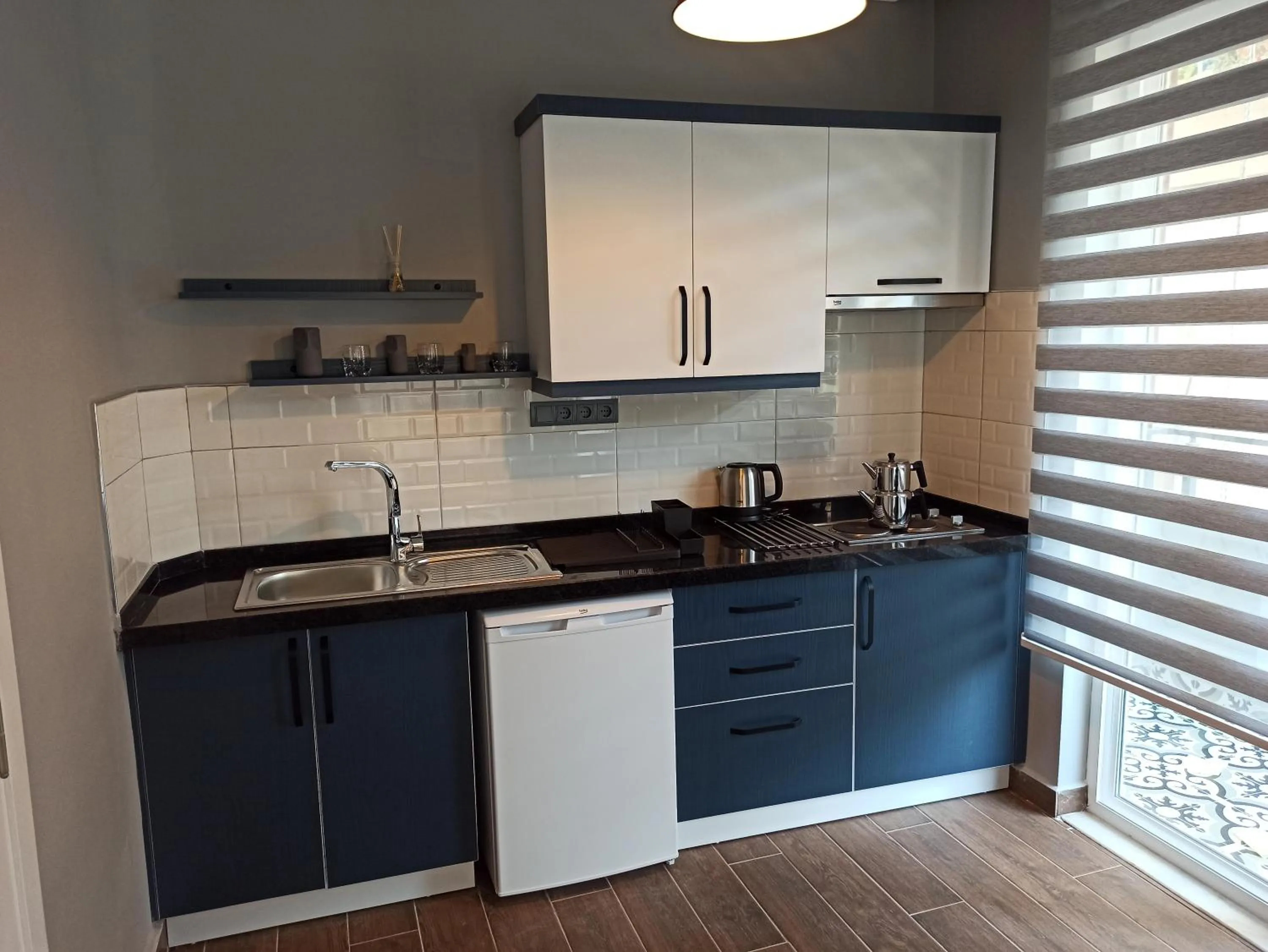 Kitchen or kitchenette in Merve Apart Hotel