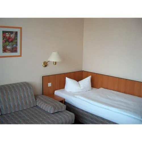 Seating area, Bed in Hotel Kubrat an der Spree