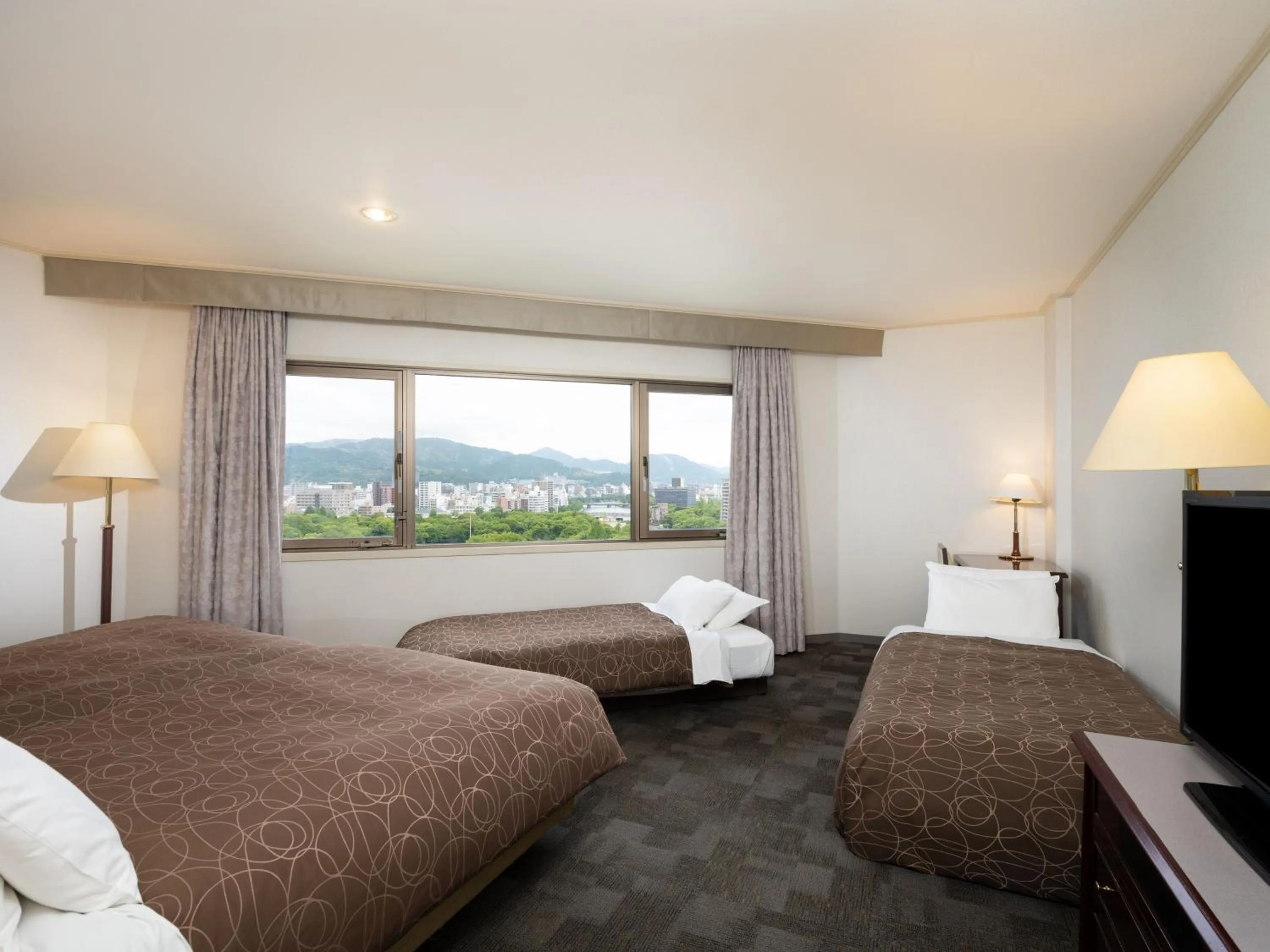 Photo of the whole room, Bed in Sotetsu Grand Fresa Hiroshima