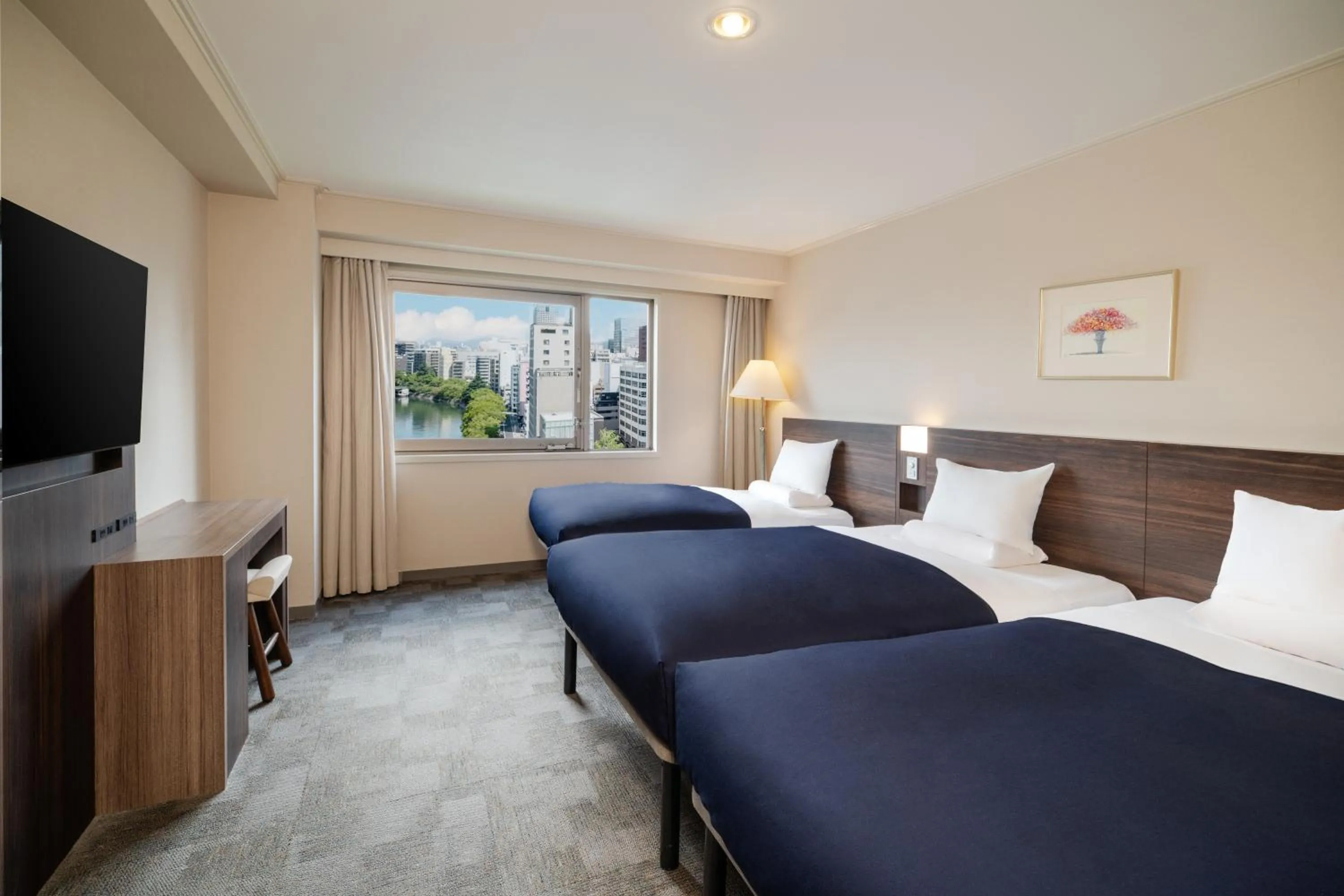 Bed in HOTEL MYSTAYS Hiroshima Peace Park