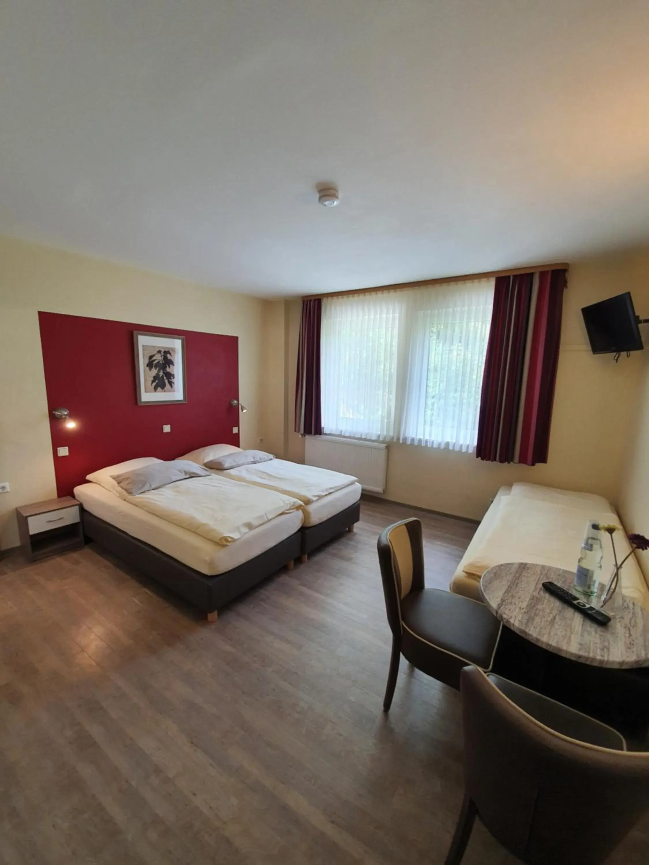 Triple Room in Hotel Bergschlösschen Triple Room in Hotel Bergschlösschen