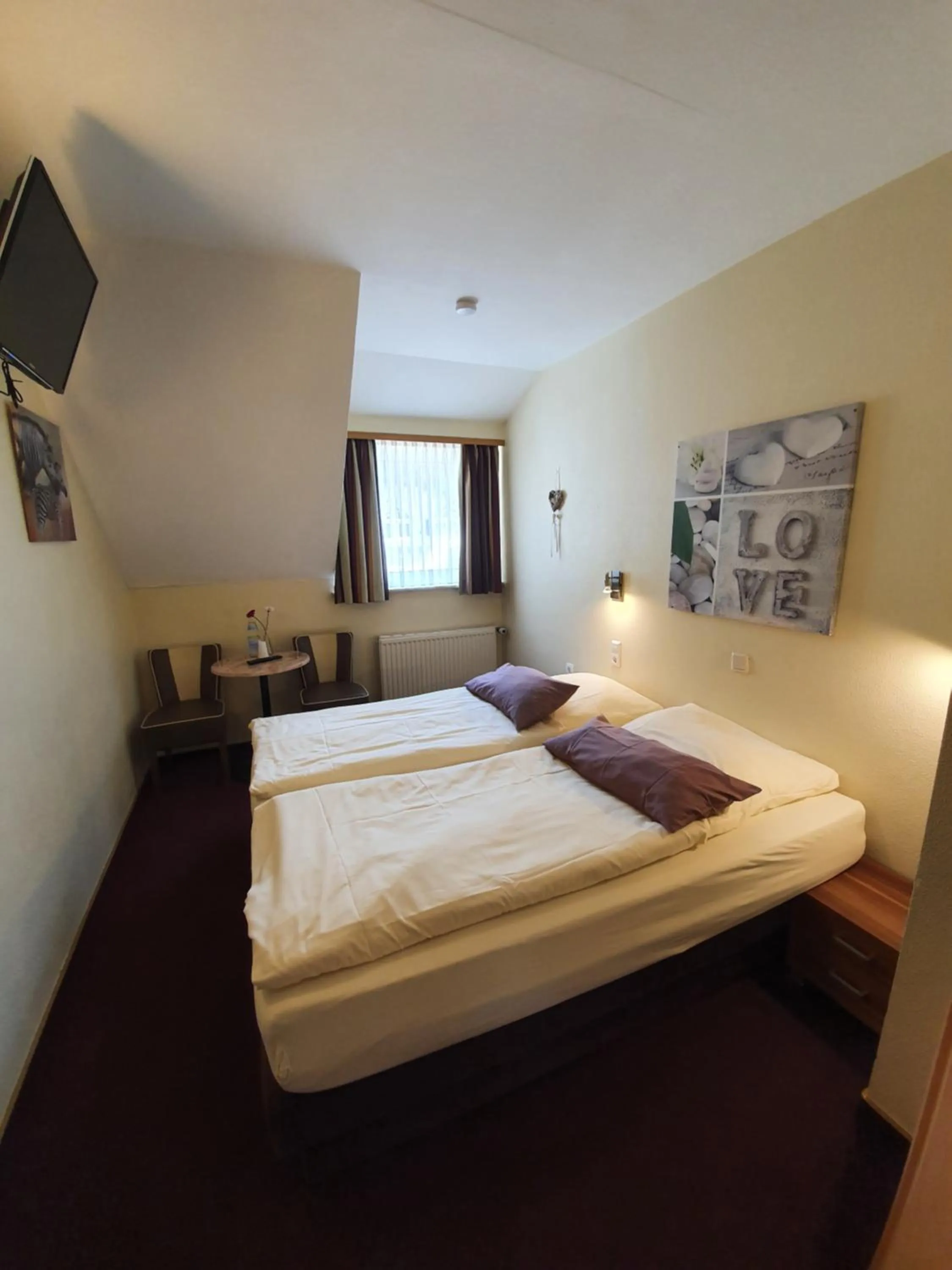 Photo of the whole room, Bed in Hotel Bergschlösschen