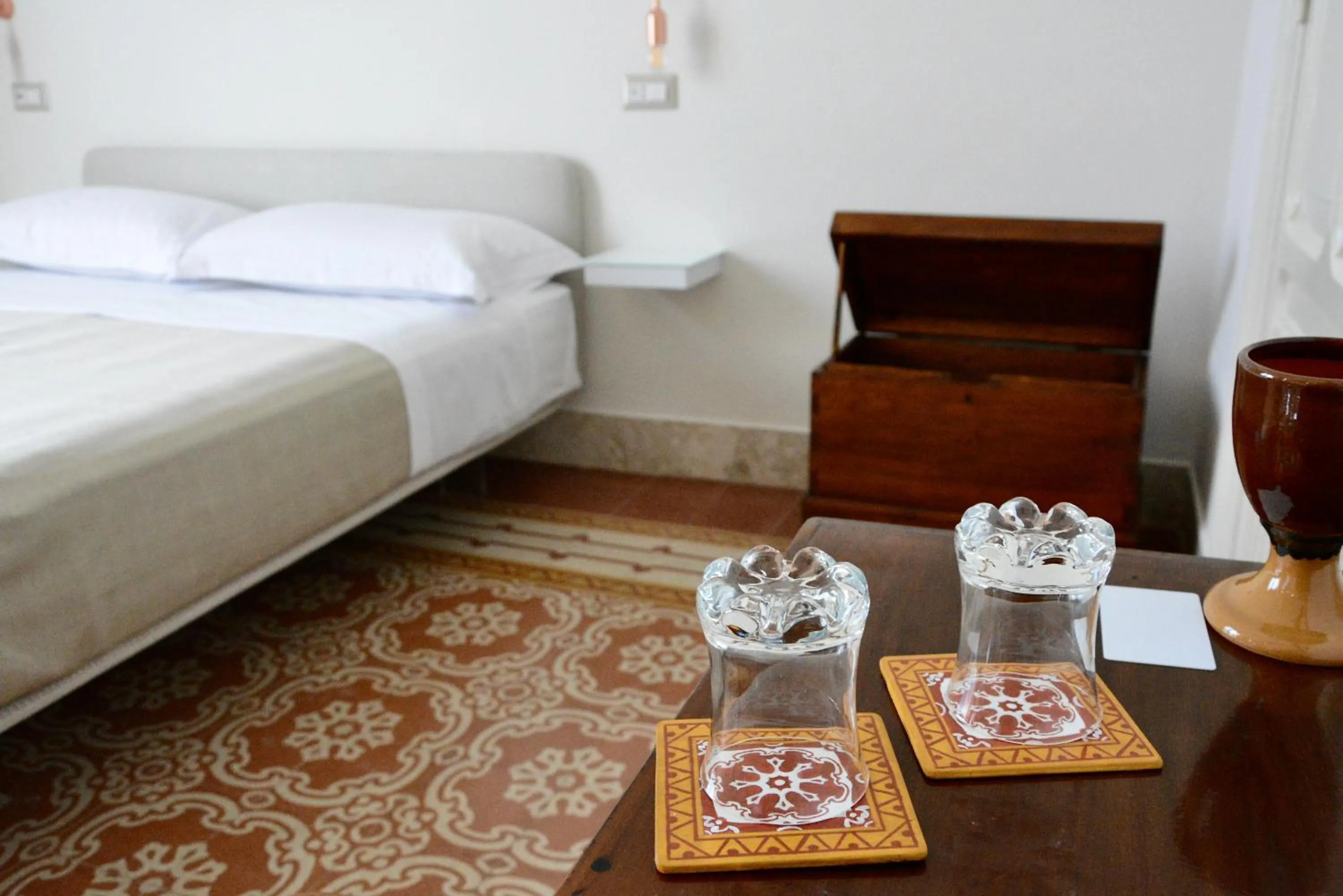 Bed in DOMUS ALERIA Deluxe Rooms