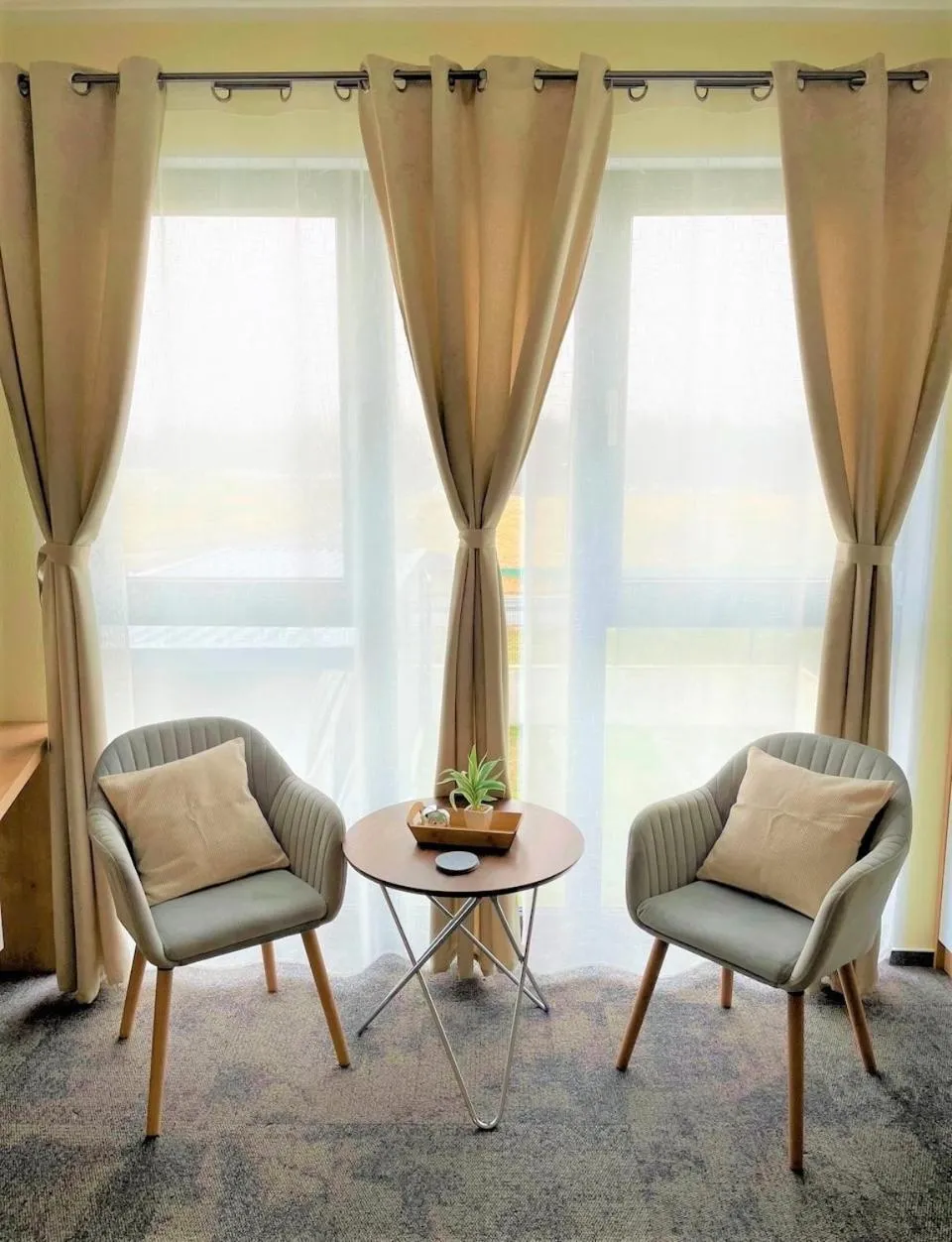 Seating area in LikeDaheim Apartments