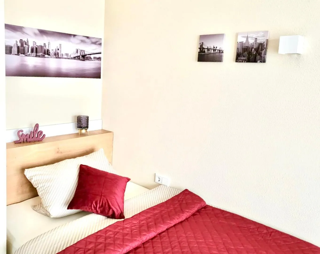 Bed in LikeDaheim Apartments