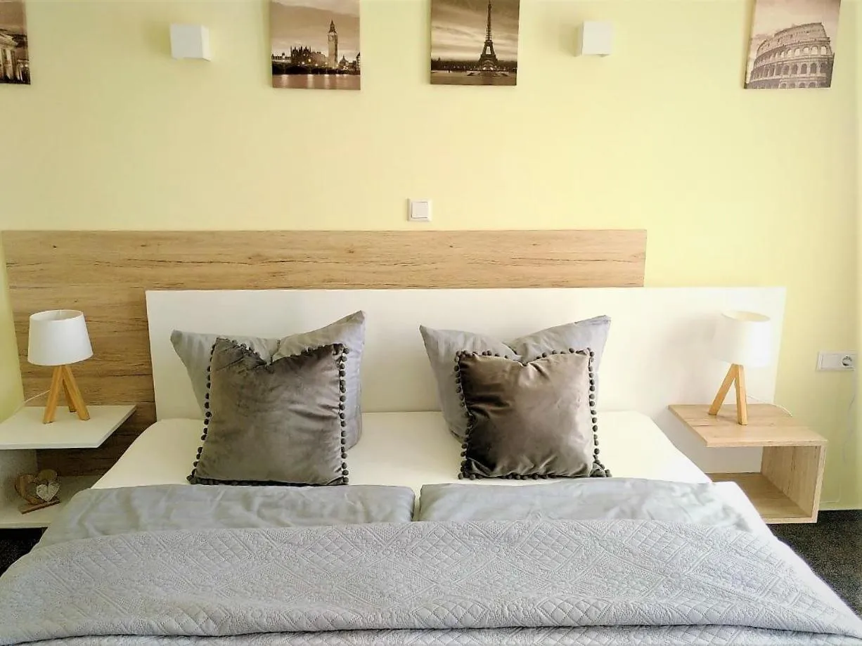 Bed in LikeDaheim Apartments