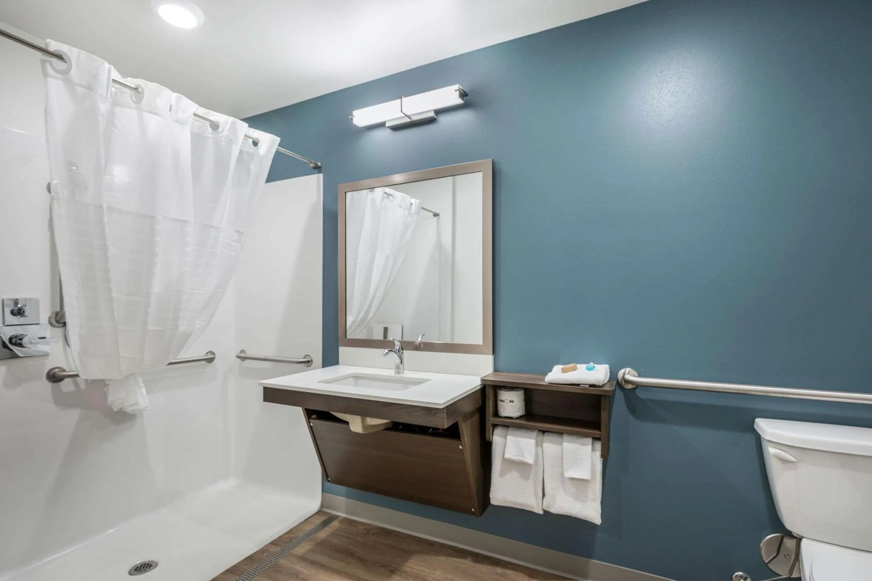 Bathroom in WoodSpring Suites Gurnee - Chicago