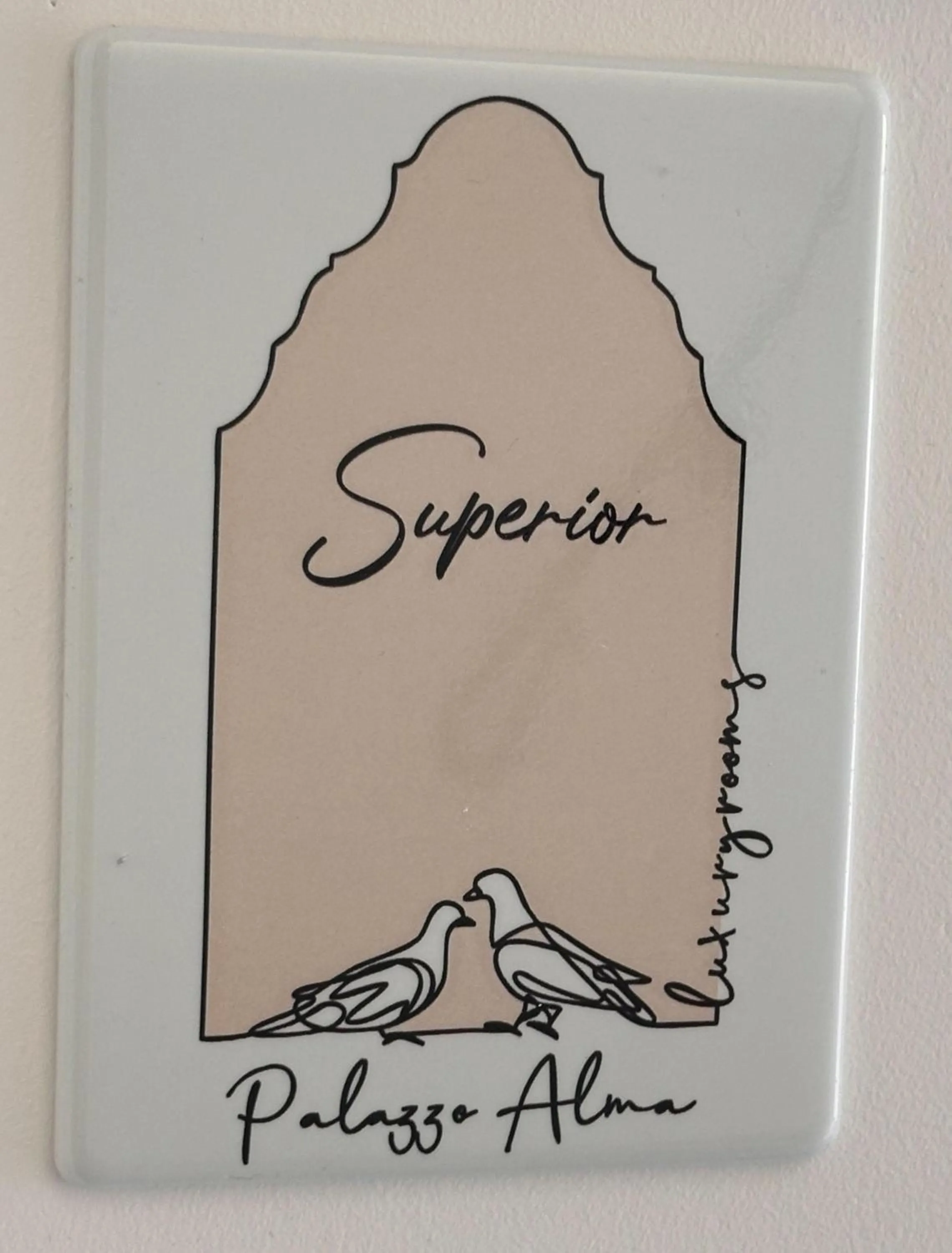 Property logo or sign in Palazzo Alma luxury rooms