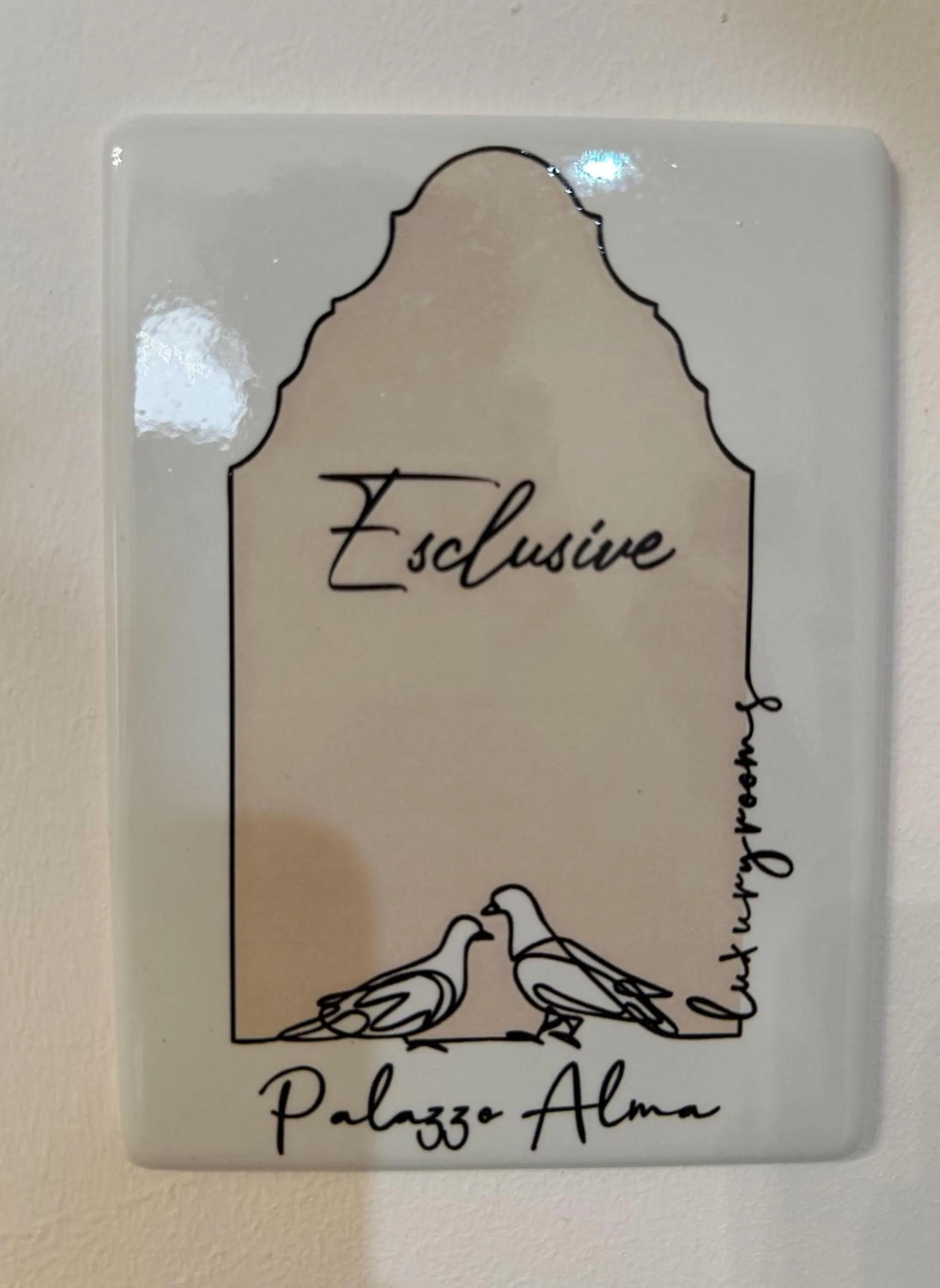 Property logo or sign in Palazzo Alma luxury rooms