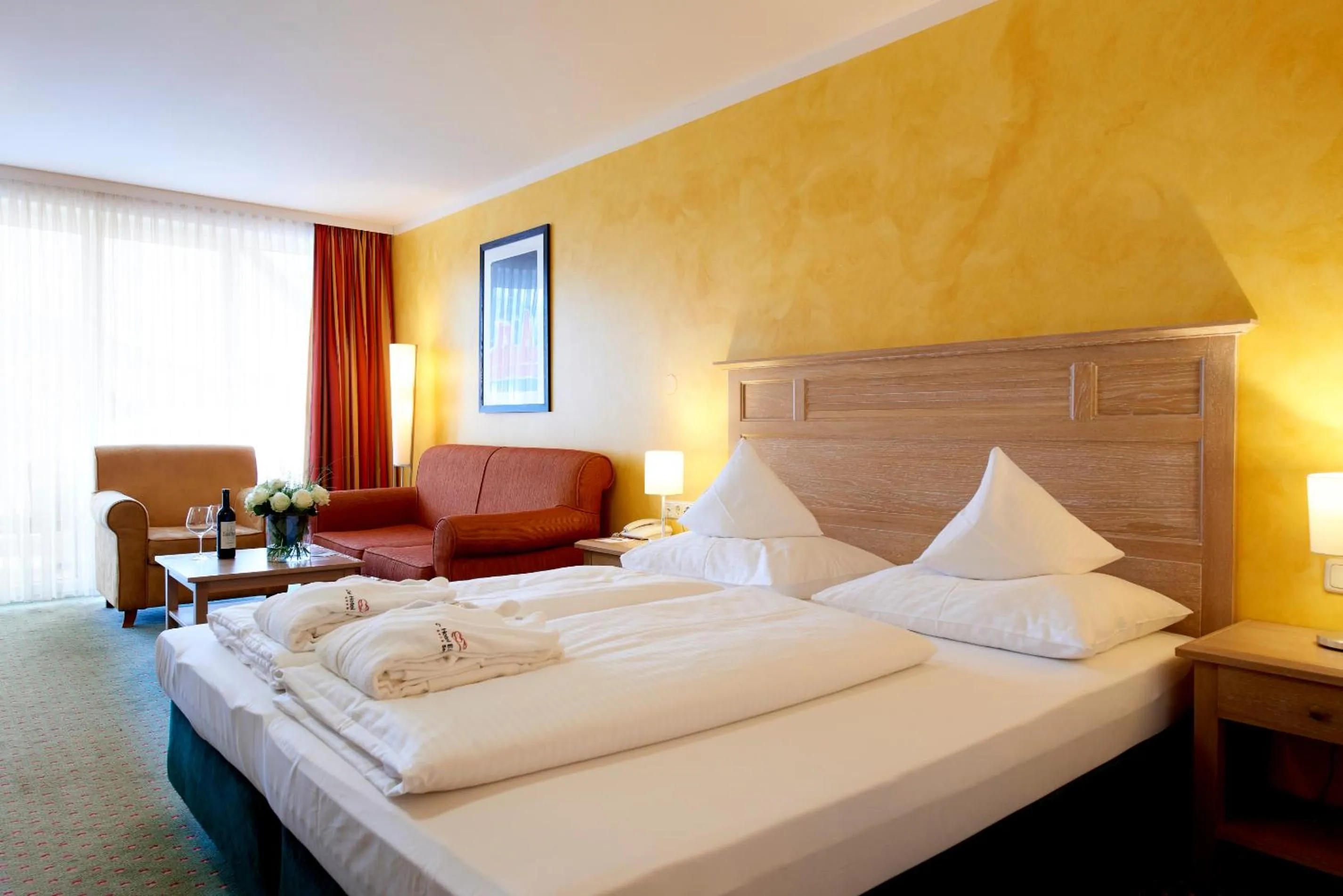 Photo of the whole room, Bed in Das Hotel Eden - Das Aktiv- & Wohlfühlhotel in Tirol auf 1200m Höhe