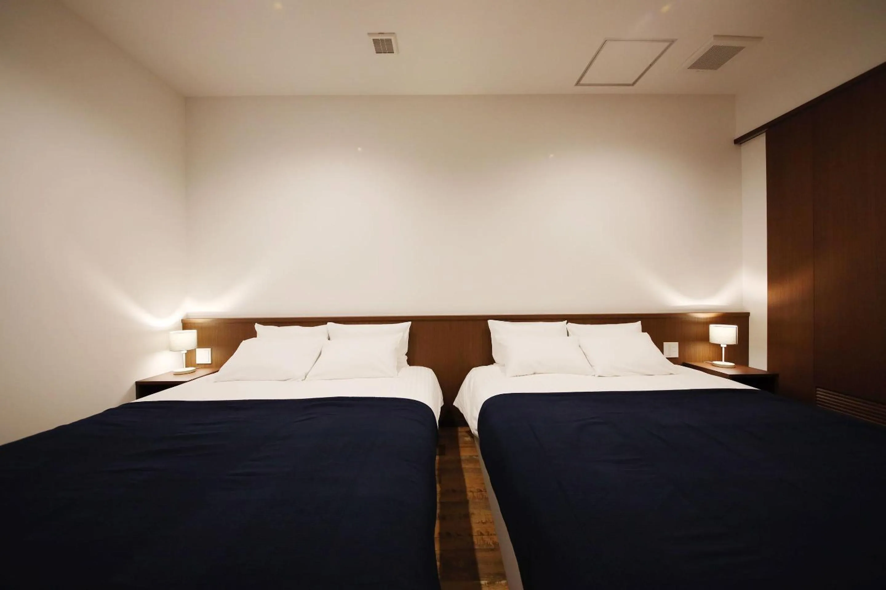 Bed in ZONK HOTEL Hakata