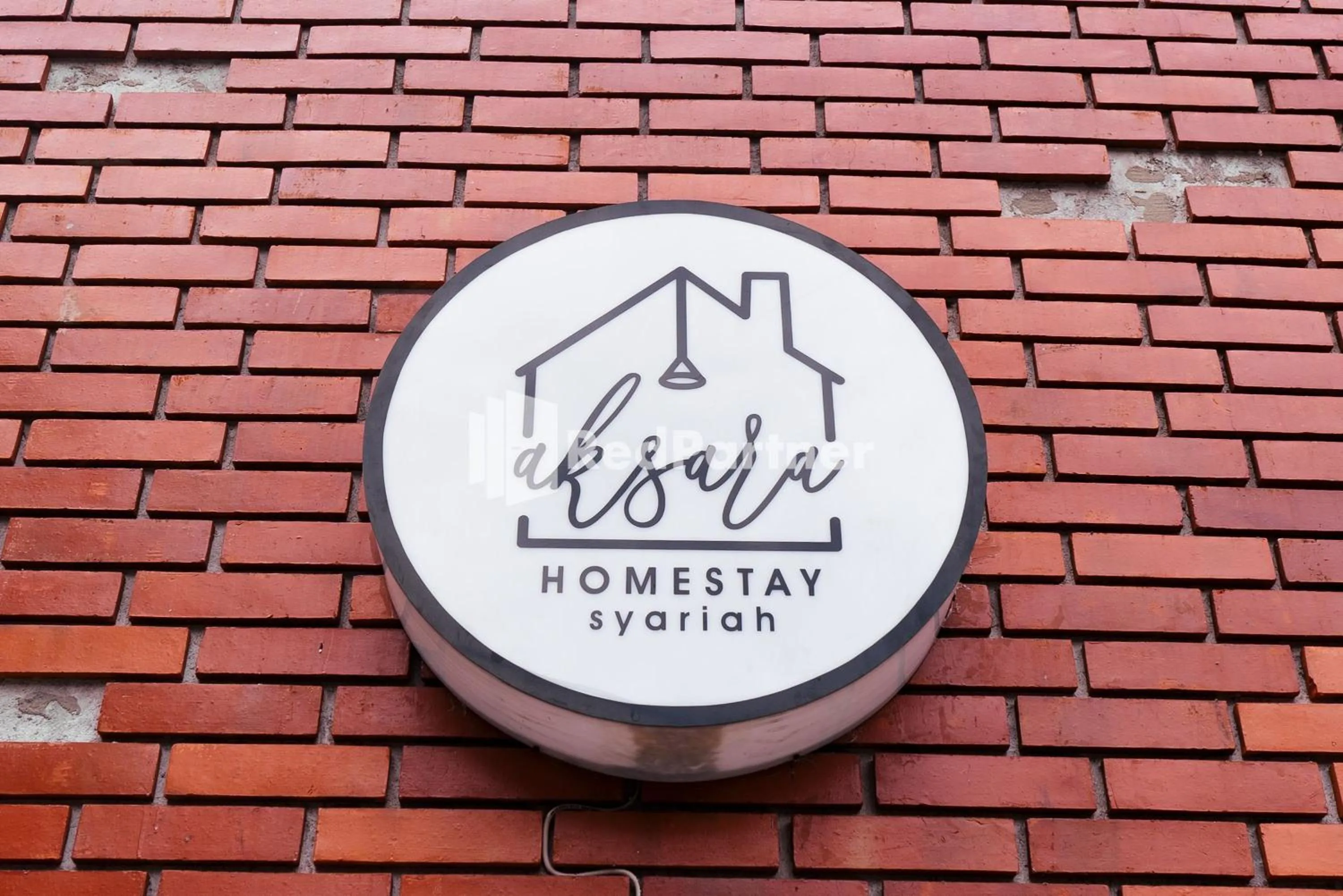Logo/Certificate/Sign in Aksara Homestay Syariah Mitra RedDoorz