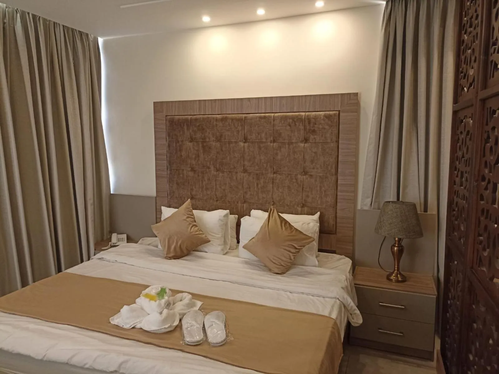 Bed in AlQimah Hotel Apartments