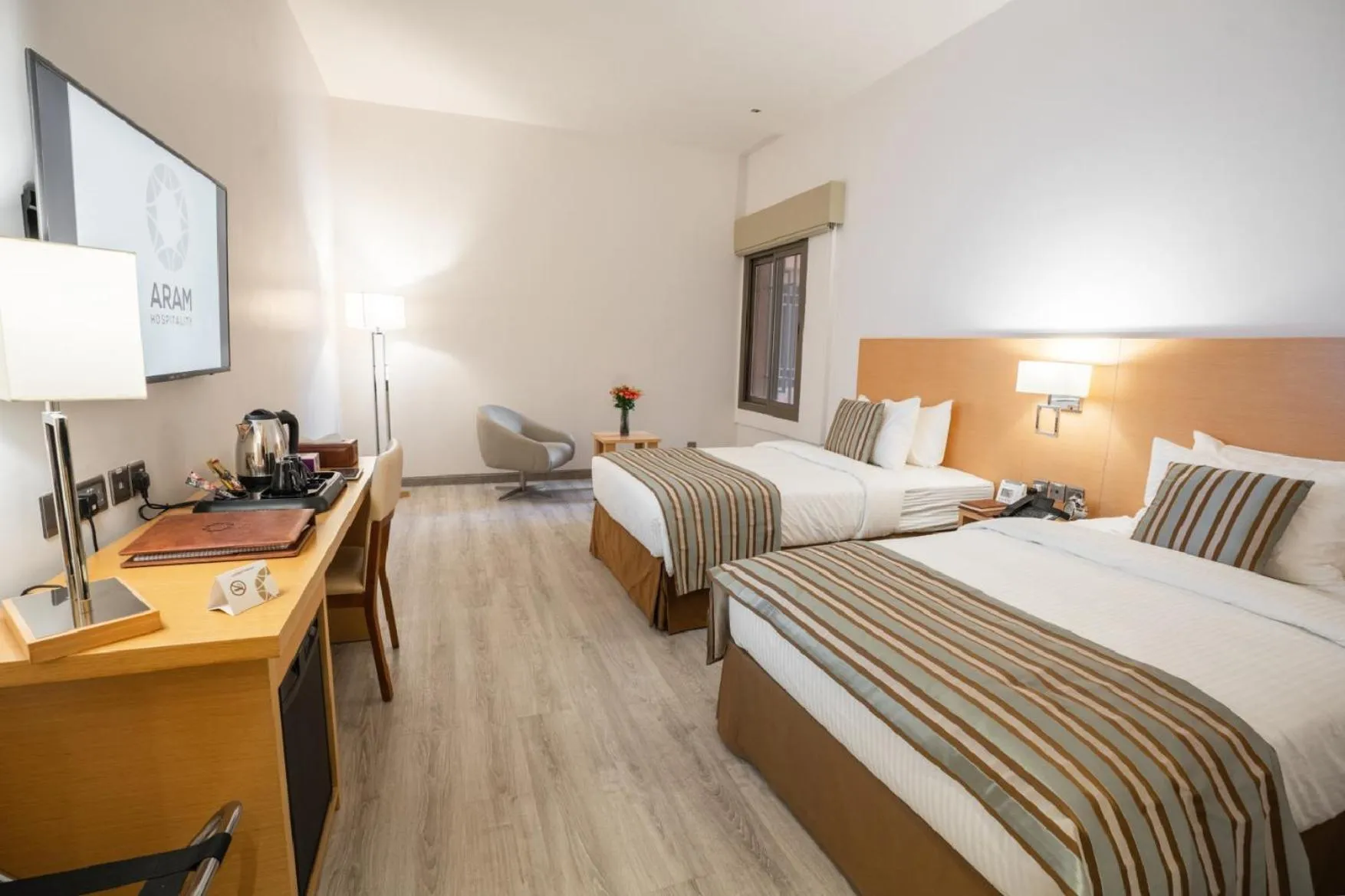 Photo of the whole room, Bed in Aram Hotel - AlMeshael Exit 18 فندق آرام - حي المشاعل مخرج 18