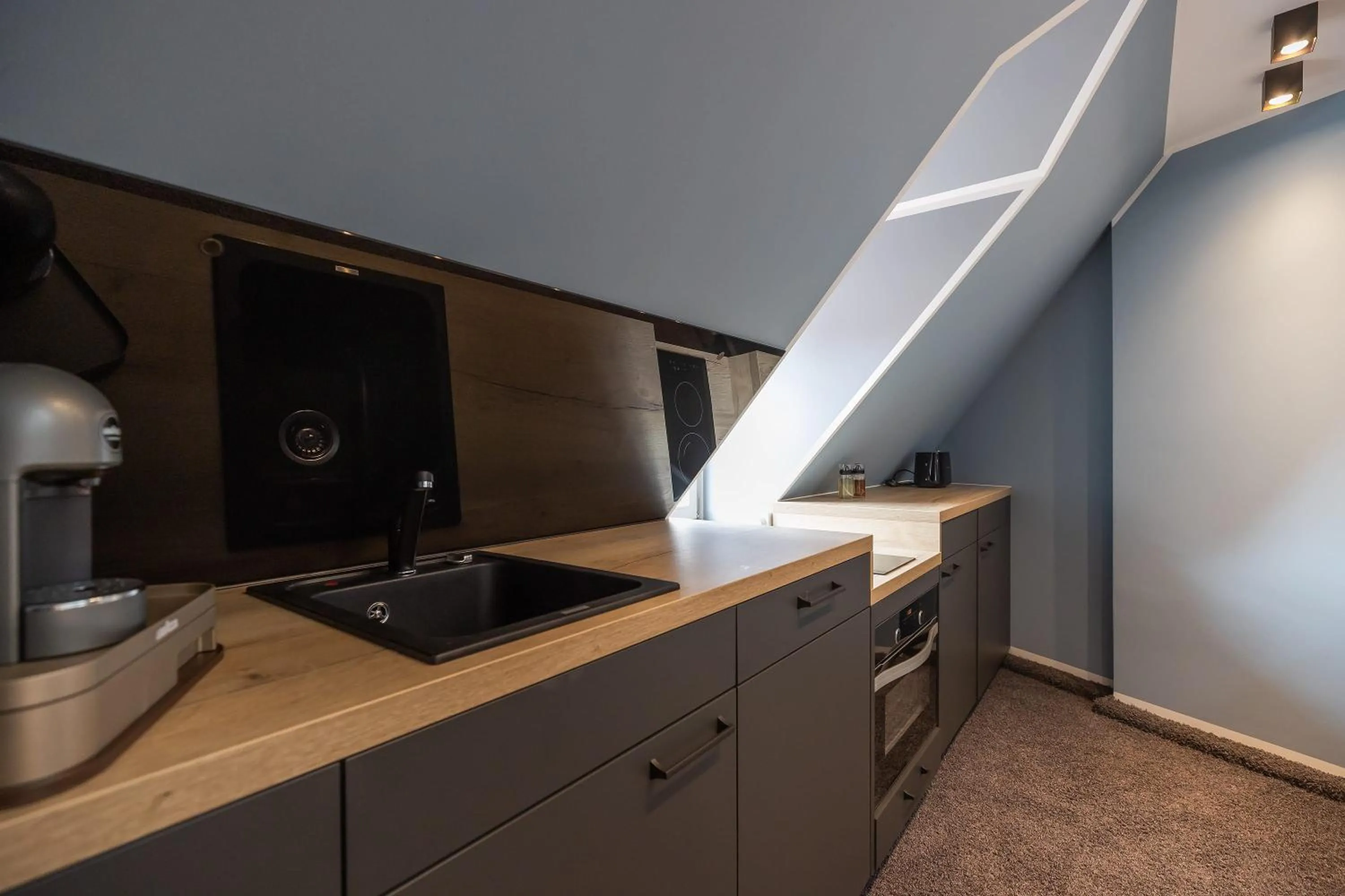 Kitchen or kitchenette in Oldtown Studios by dasPaul