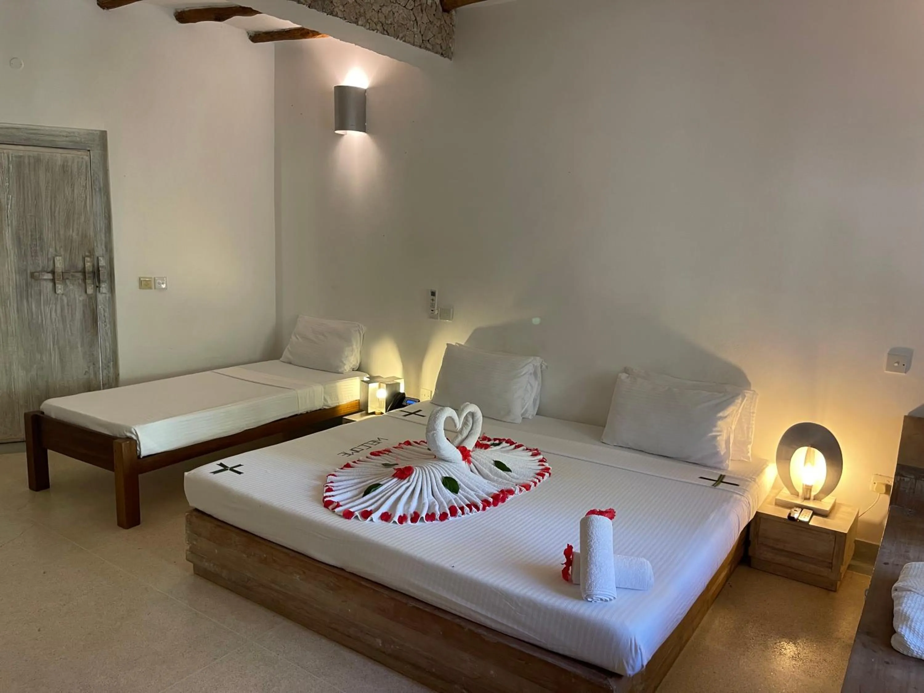 Bed in Mawe Zuri Resort