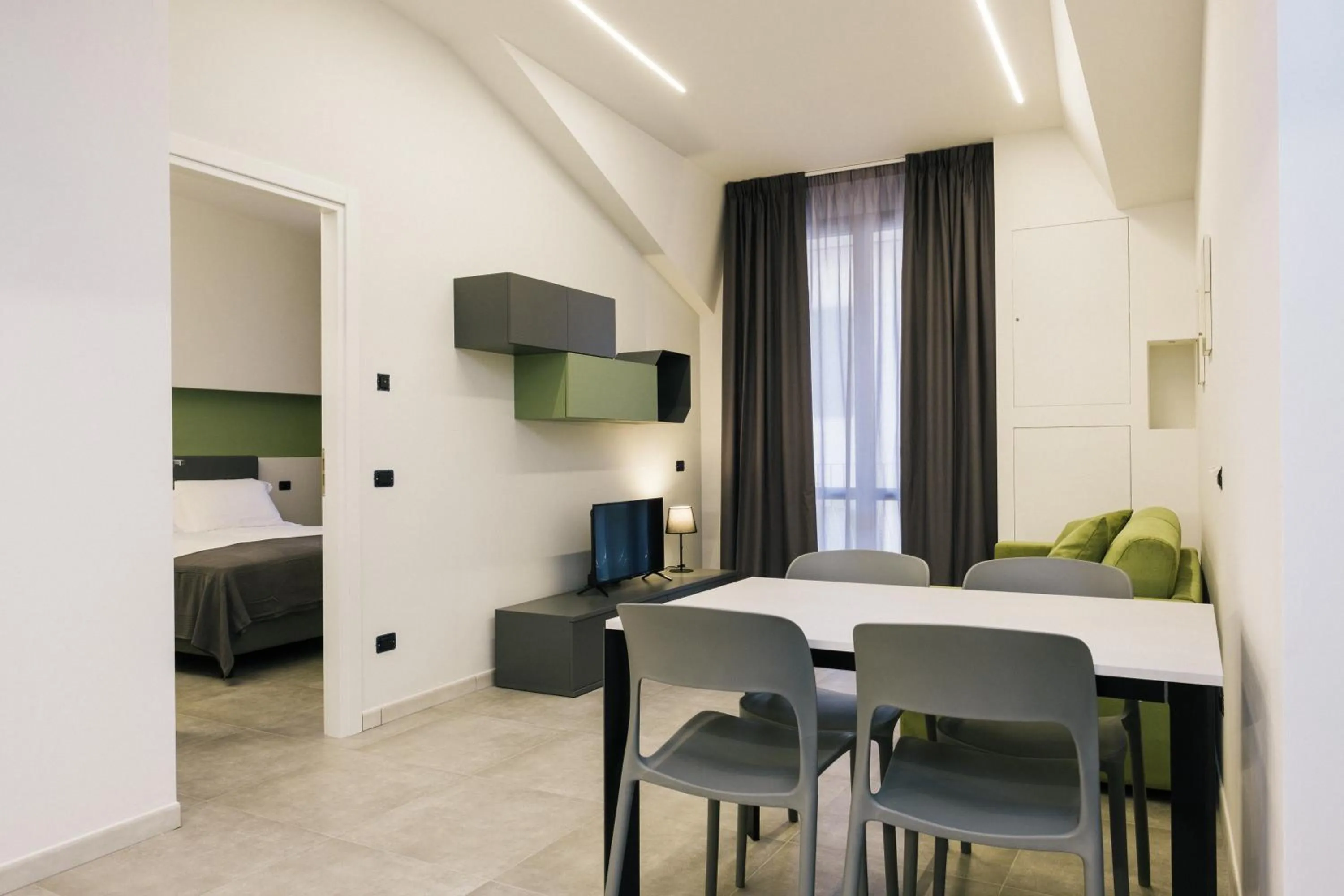 Living room, Bed in Amiata Suite