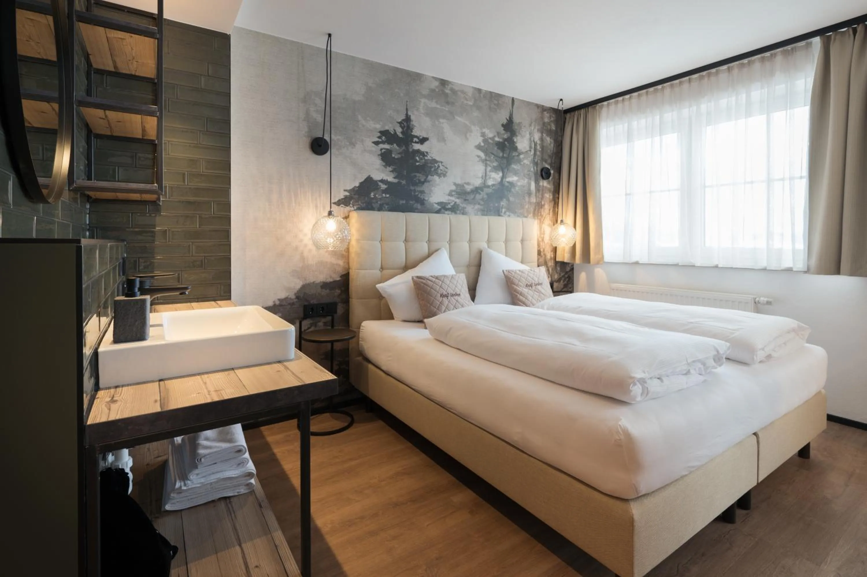 Photo of the whole room, Bed in Alpendorf Hotel Stern