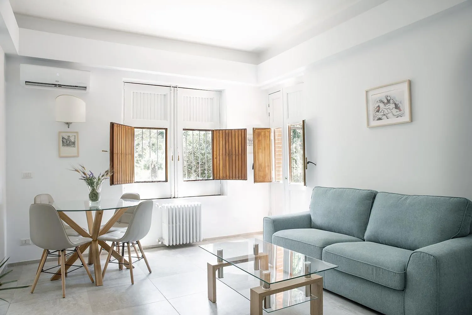 Communal lounge/ TV room in Euphorbia Apartment by Wonderful Italy