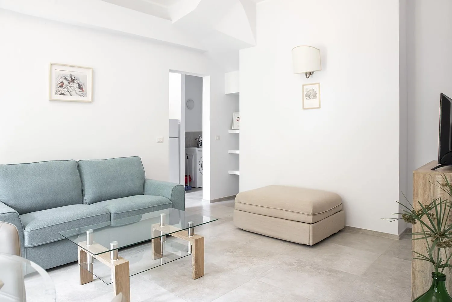 Communal lounge/ TV room in Euphorbia Apartment by Wonderful Italy
