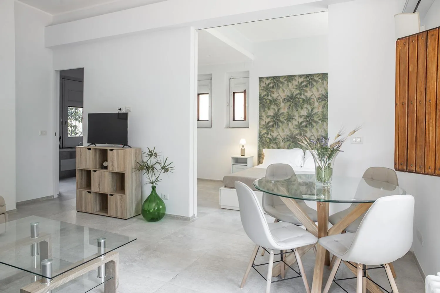 Communal lounge/ TV room in Euphorbia Apartment by Wonderful Italy