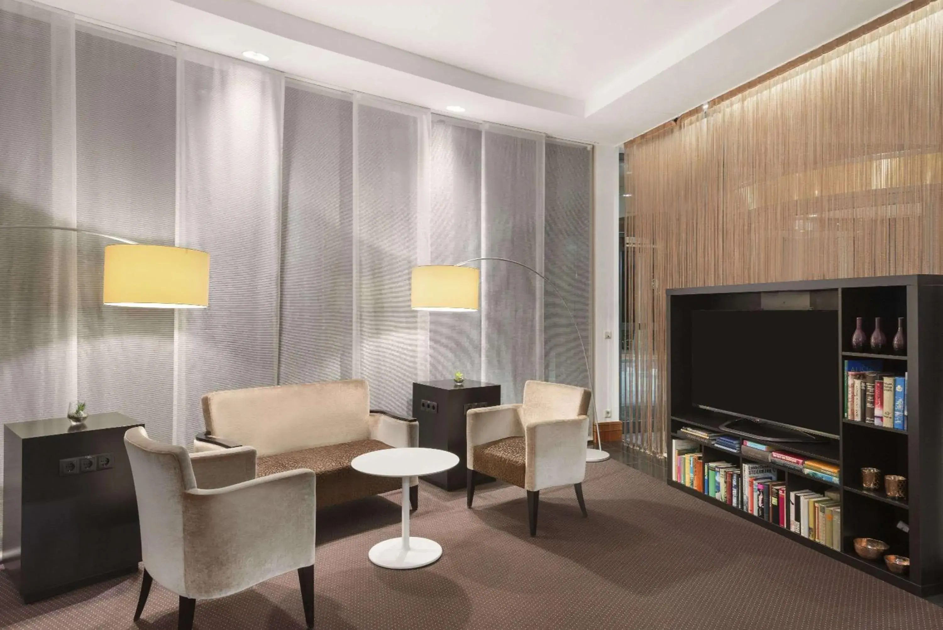 Lobby or reception in Hotel Ramada by Wyndham Graz Lobby or reception in Hotel Ramada by Wyndham Graz